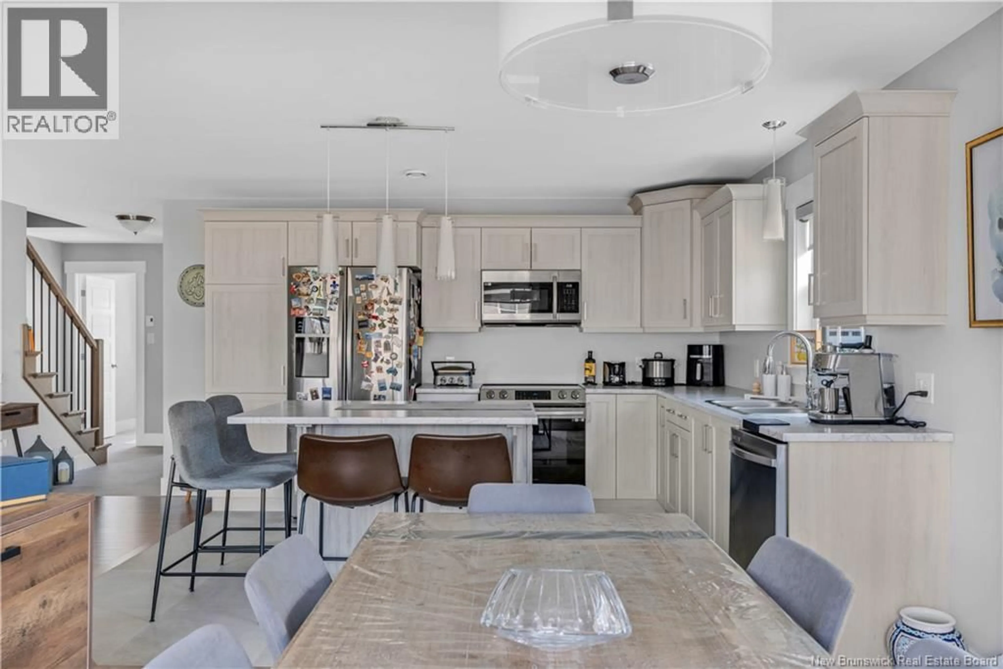 Open concept kitchen, ceramic/tile floor for 94 BASTARACHE STREET, Dieppe New Brunswick E1A6Y3