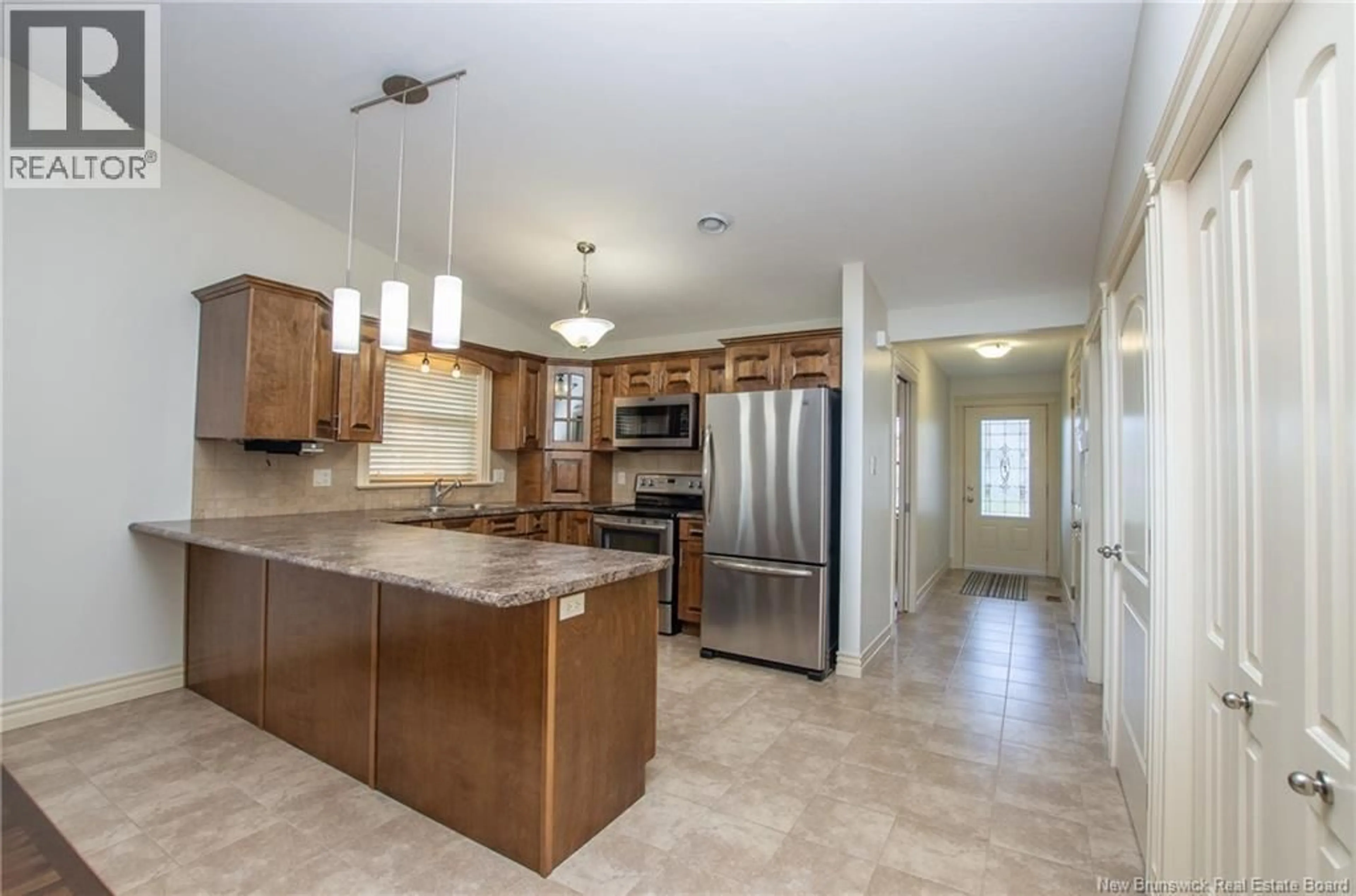 Open concept kitchen, ceramic/tile floor for 2 THORNHILL CRESCENT, Moncton New Brunswick E1A6B4