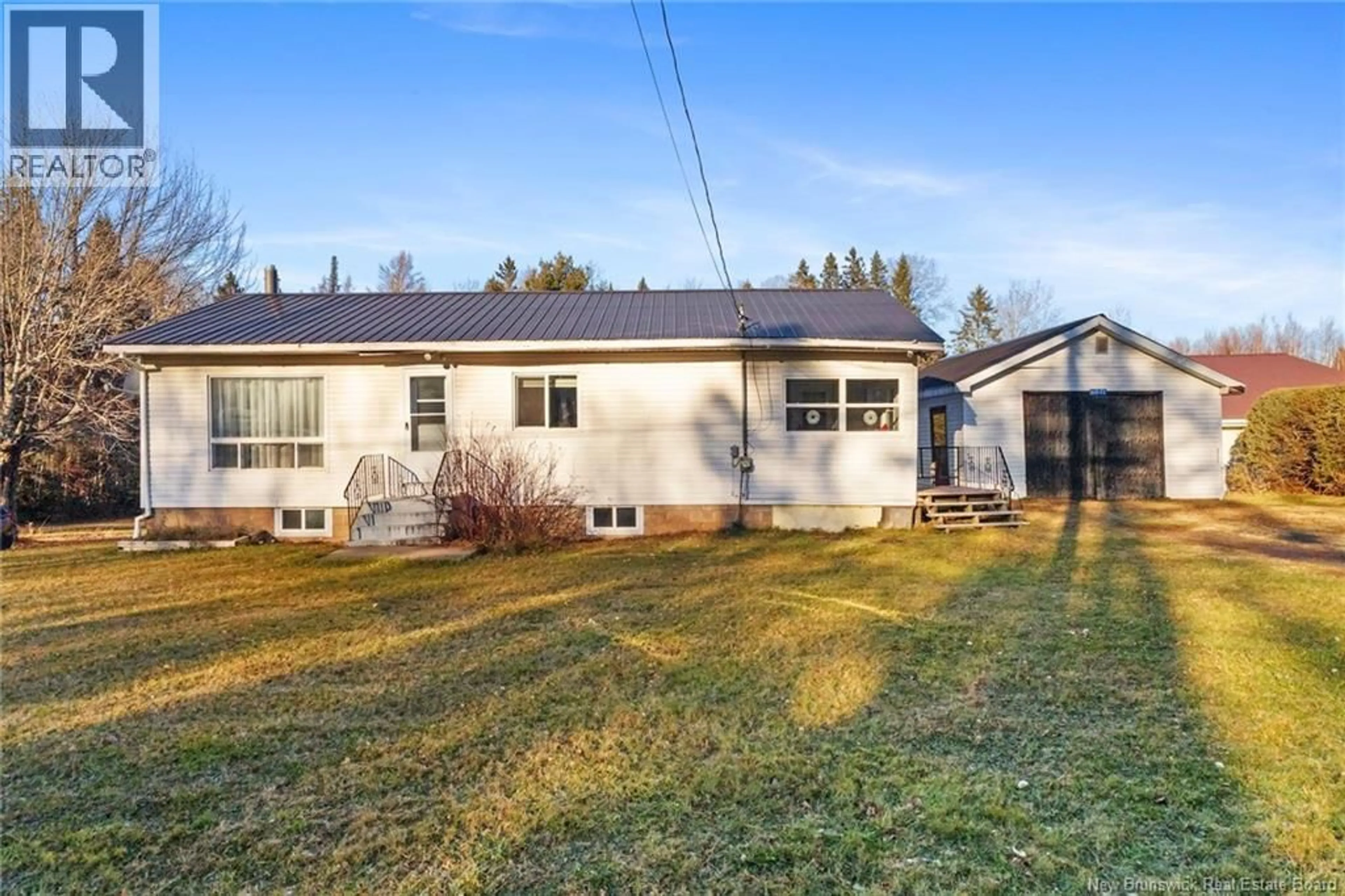 Home with vinyl exterior material, street for 6071 ROUTE 10, Upper Salmon Creek New Brunswick E4A1B9