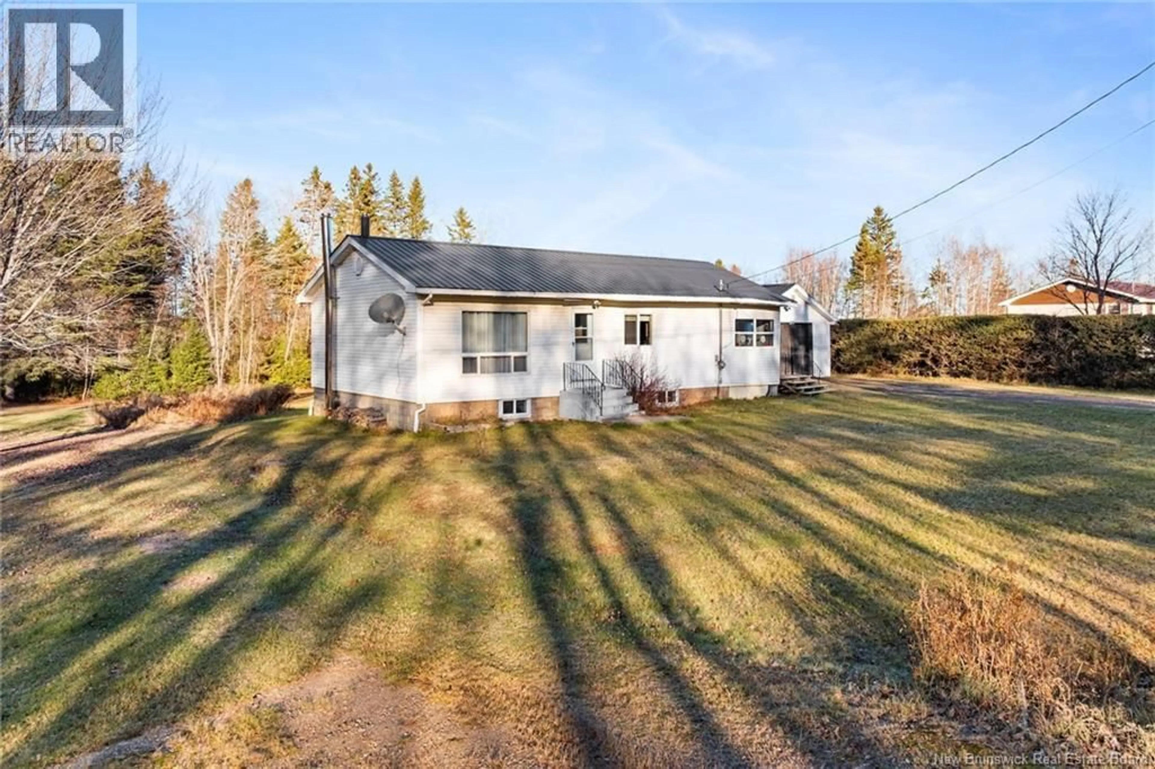 A pic from outside/outdoor area/front of a property/back of a property/a pic from drone, unknown for 6071 ROUTE 10, Upper Salmon Creek New Brunswick E4A1B9