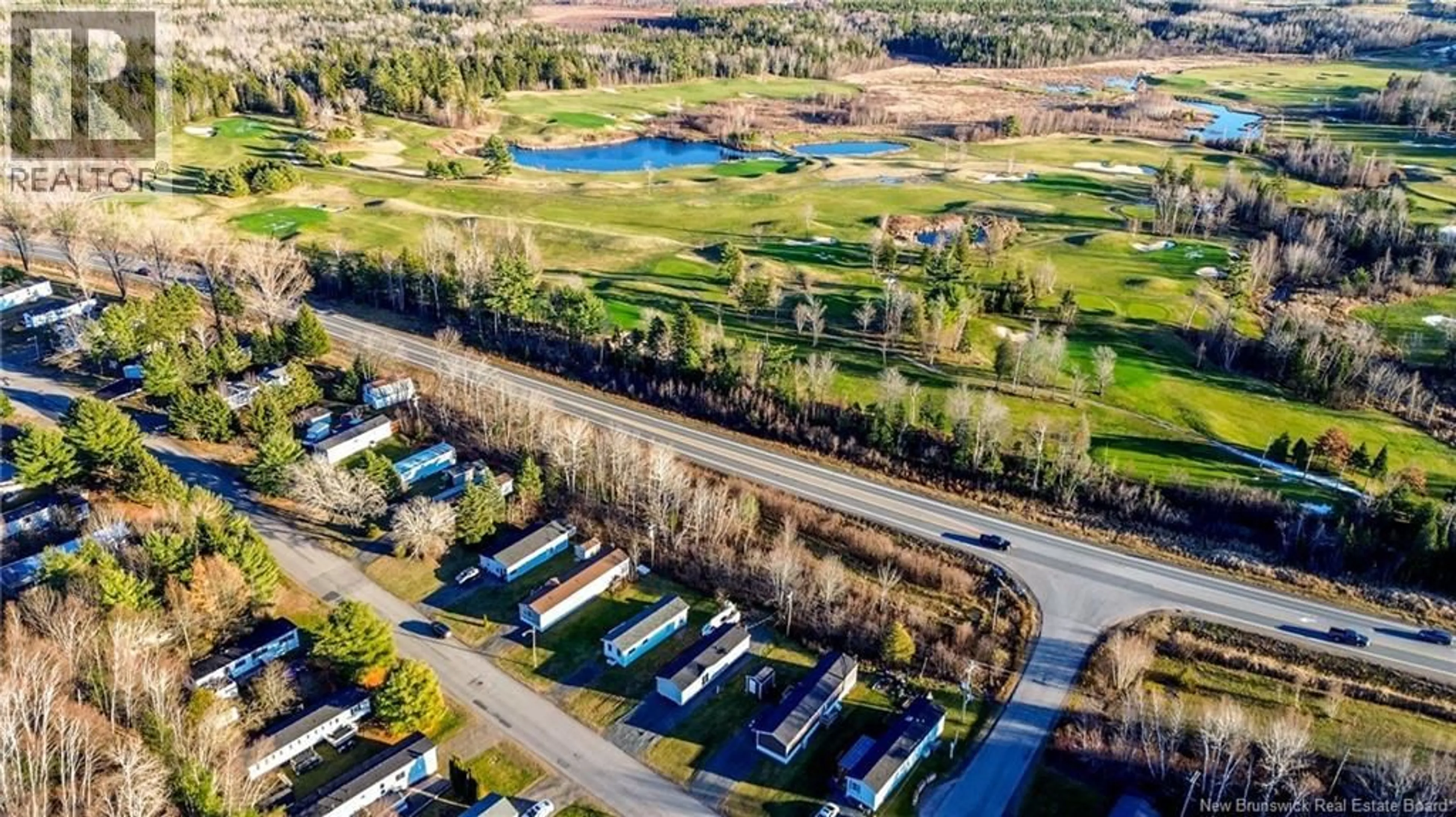A pic from outside/outdoor area/front of a property/back of a property/a pic from drone, water/lake/river/ocean view for 147 HEDGEVIEW DRIVE, Fredericton New Brunswick E3B6R9