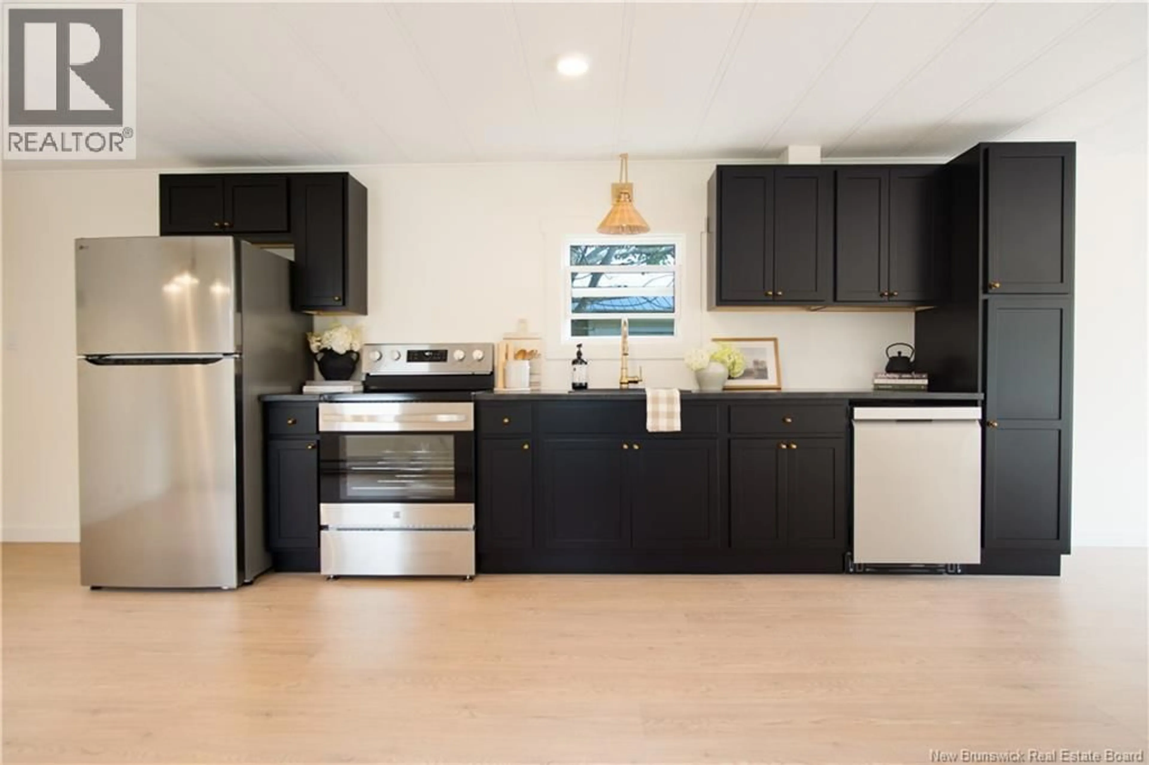 Open concept kitchen, wood/laminate floor for 46 HEDGEVIEW DRIVE, Fredericton New Brunswick E3B6S2