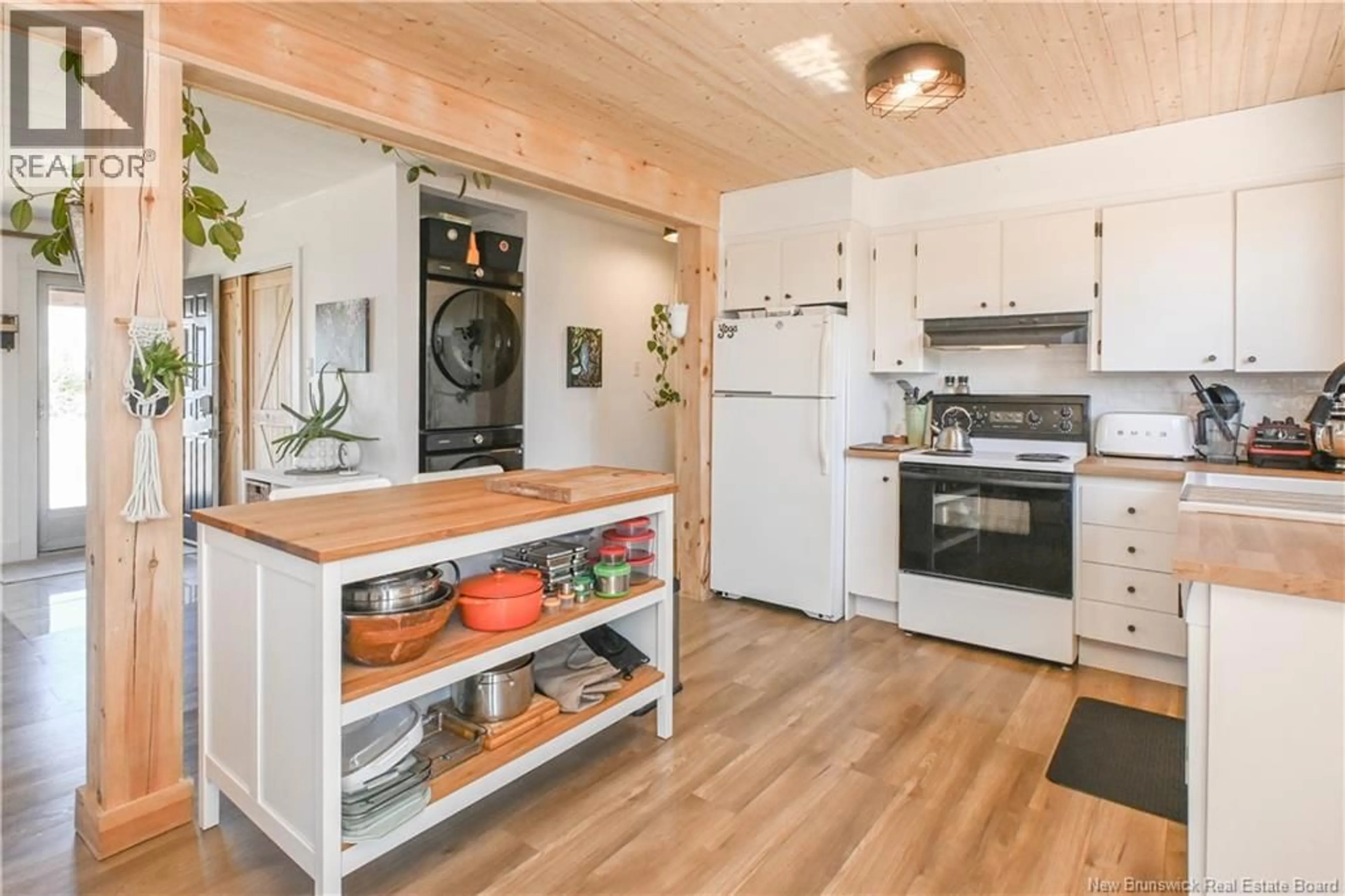 Open concept kitchen, wood/laminate floor for 3180 ALCIDE STREET, Tracadie New Brunswick E1X1A5