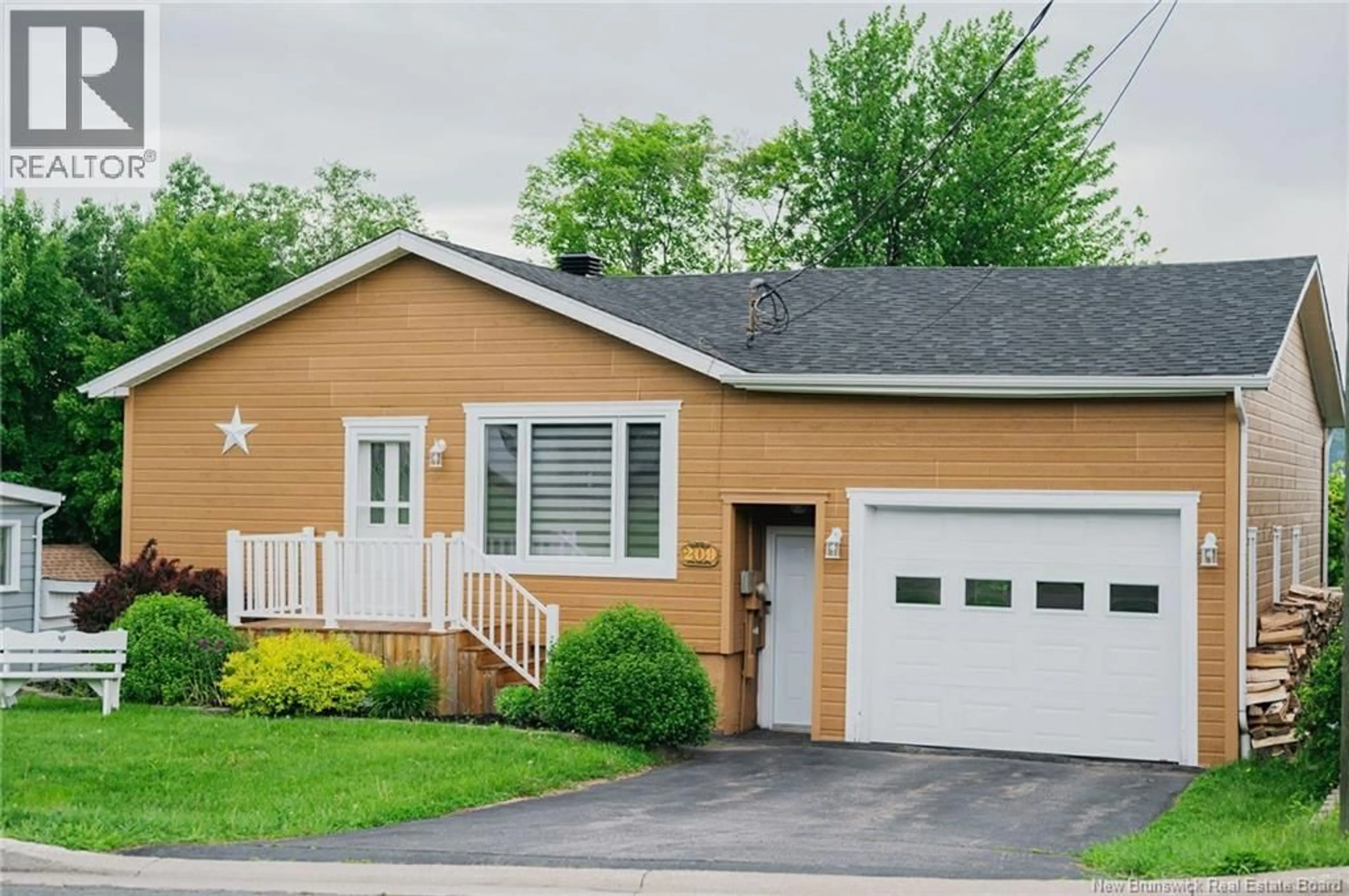 Home with vinyl exterior material, street for 209 ST LOUIS STREET, Atholville New Brunswick E3N4C2