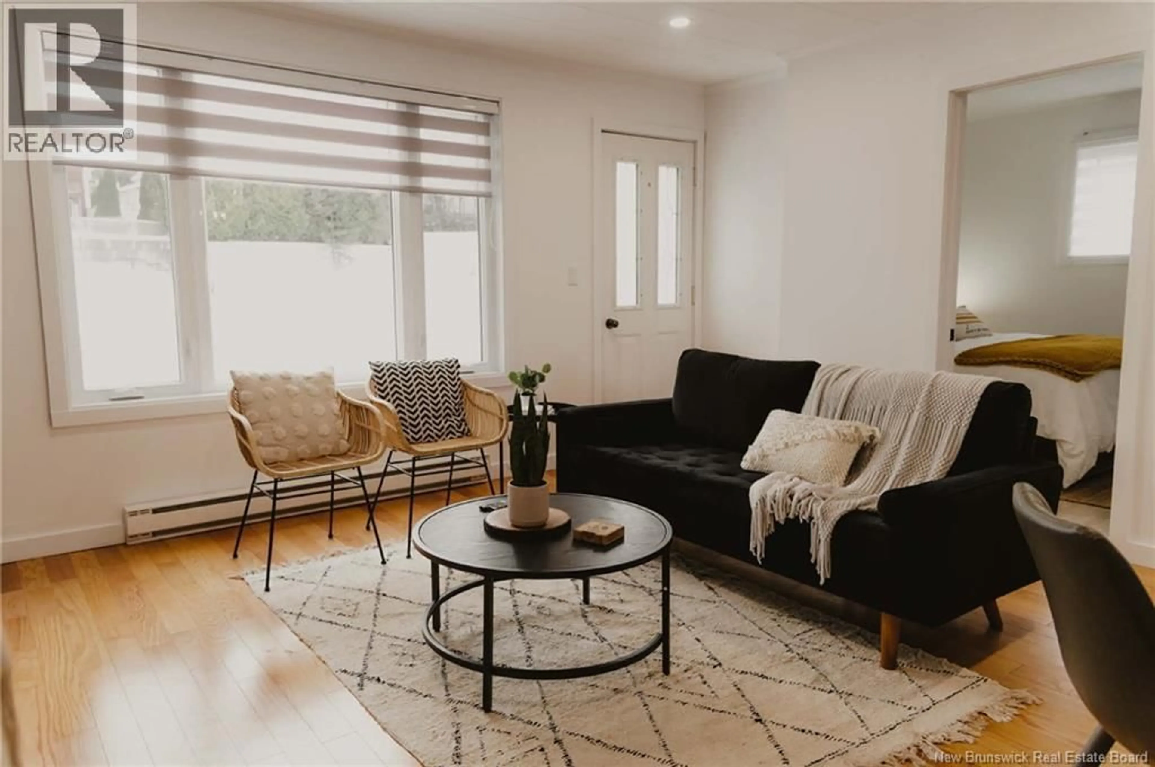 Living room with furniture, unknown for 209 ST LOUIS STREET, Atholville New Brunswick E3N4C2