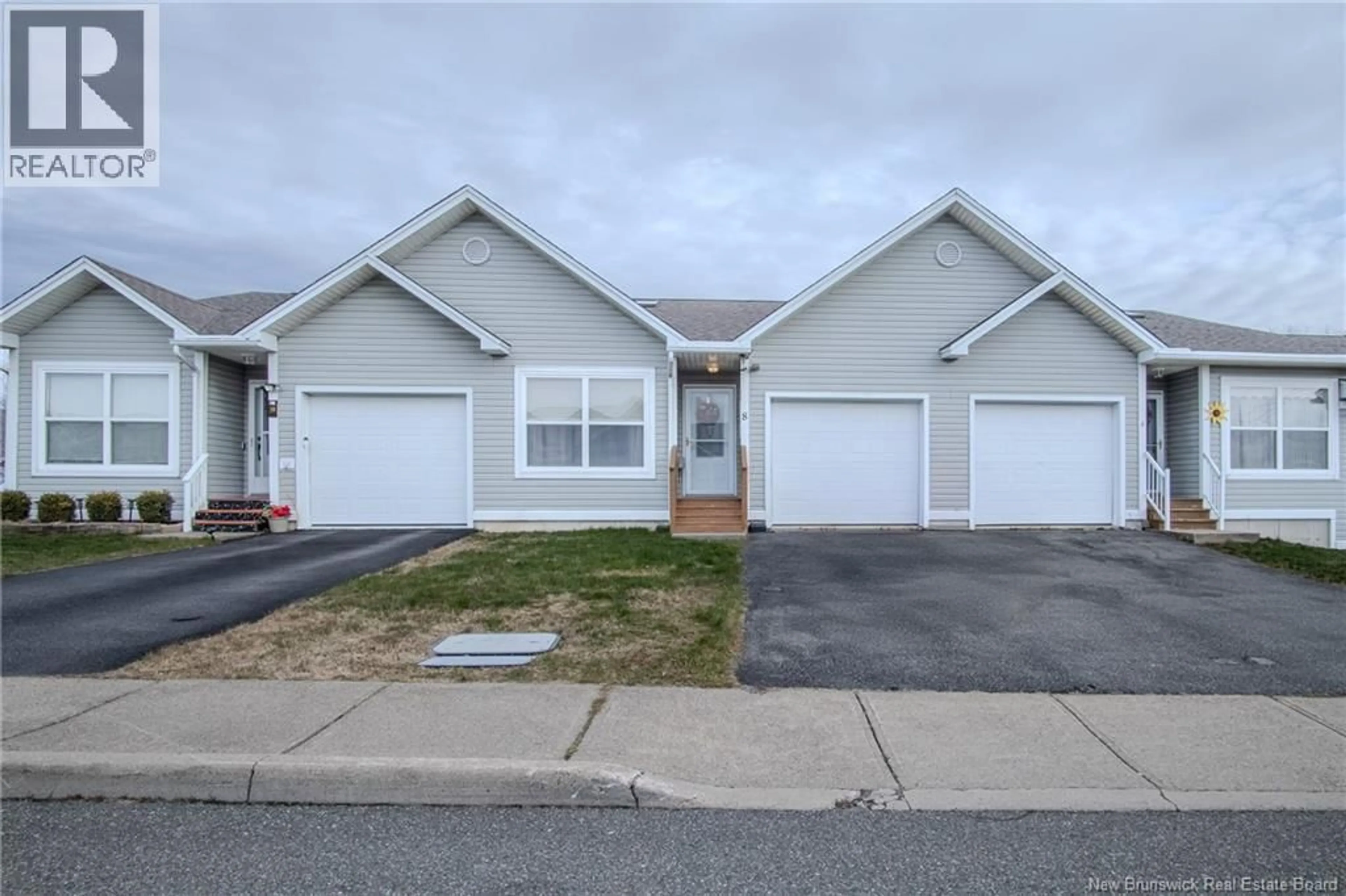 Home with vinyl exterior material, street for 8 ST PETERS COURT, Saint John New Brunswick E2K5N4