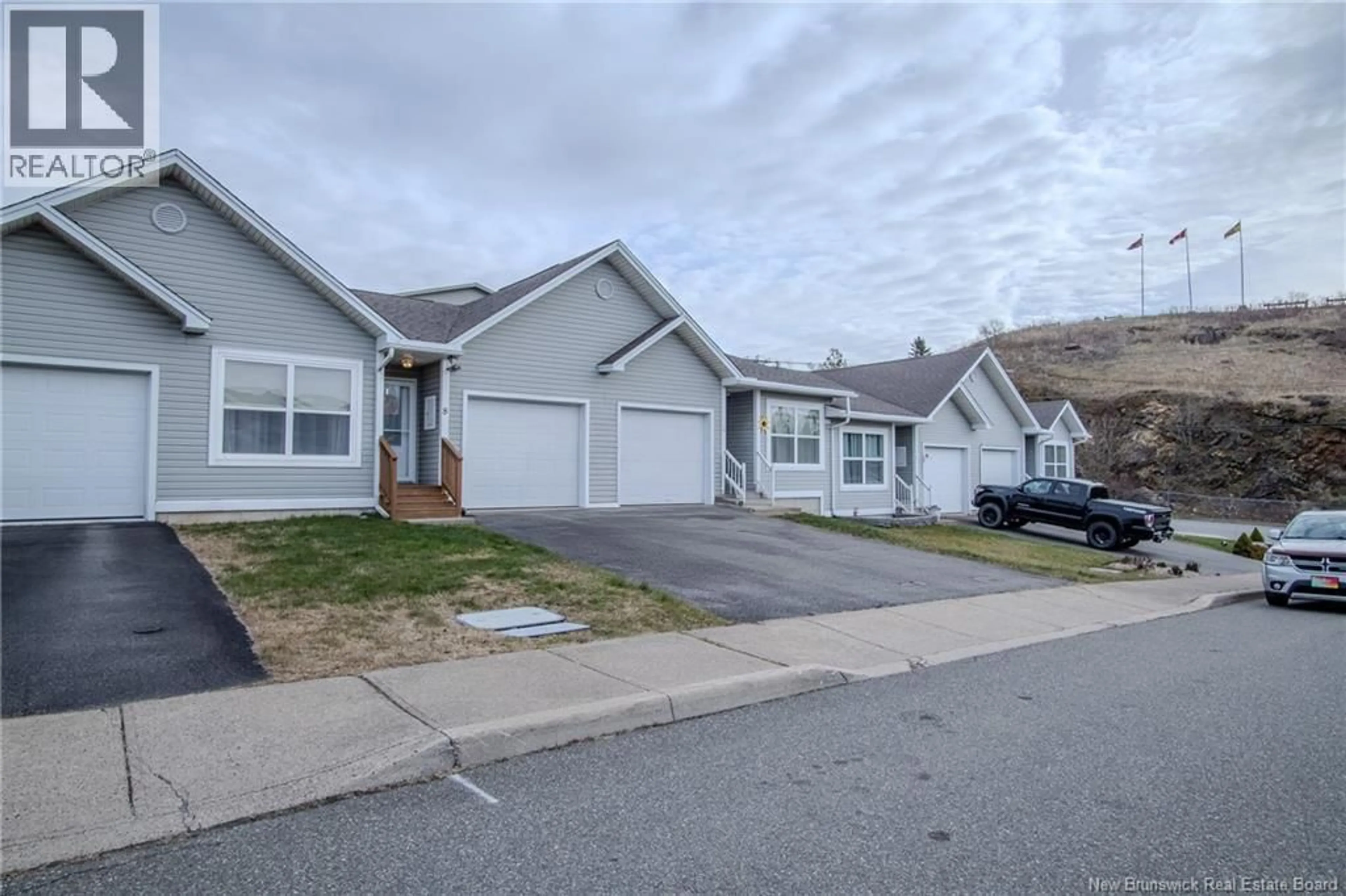 Home with vinyl exterior material, street for 8 ST PETERS COURT, Saint John New Brunswick E2K5N4