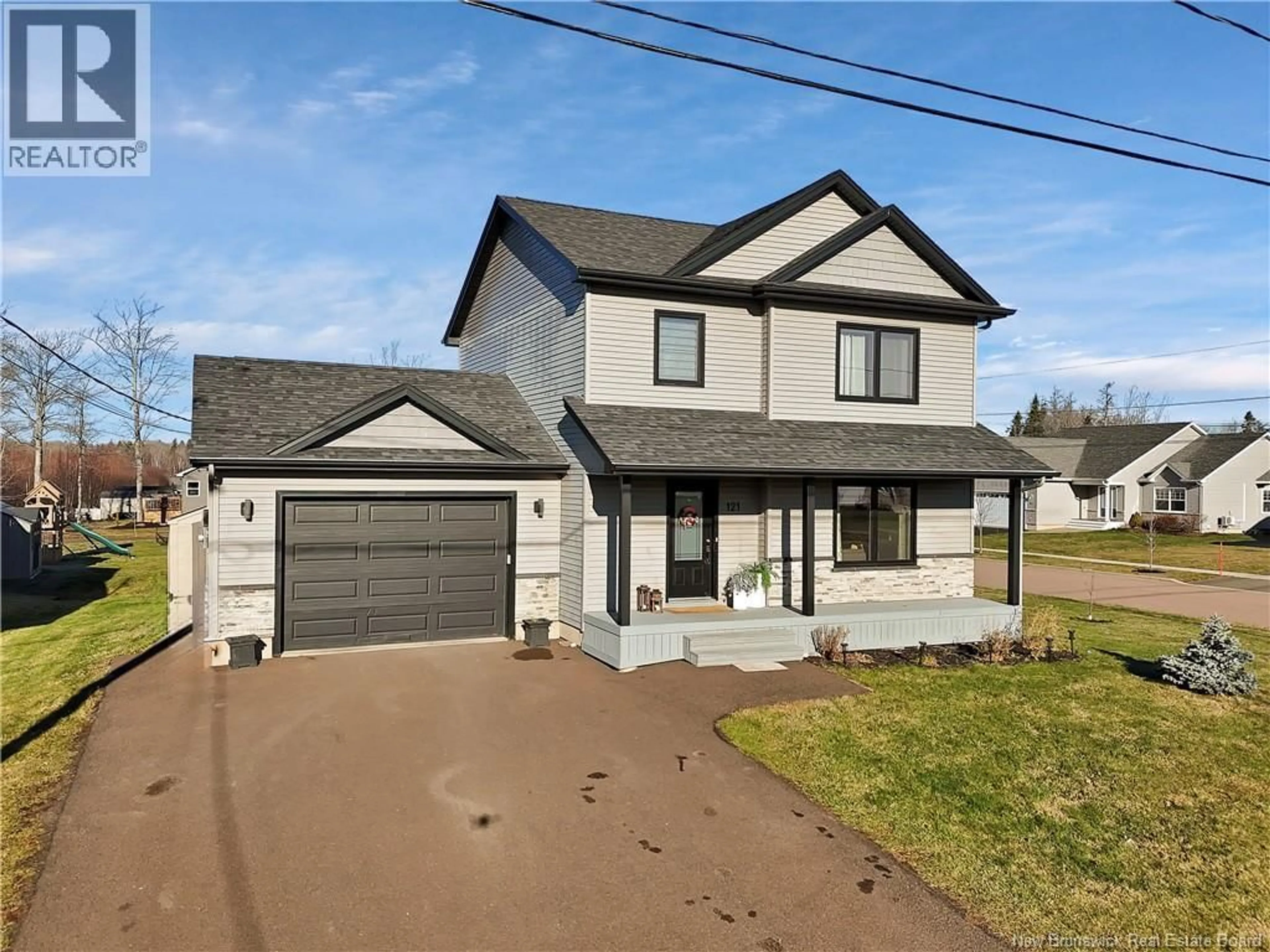 Home with vinyl exterior material, street for 121 O'NEILL STREET, Moncton New Brunswick E1A9L9