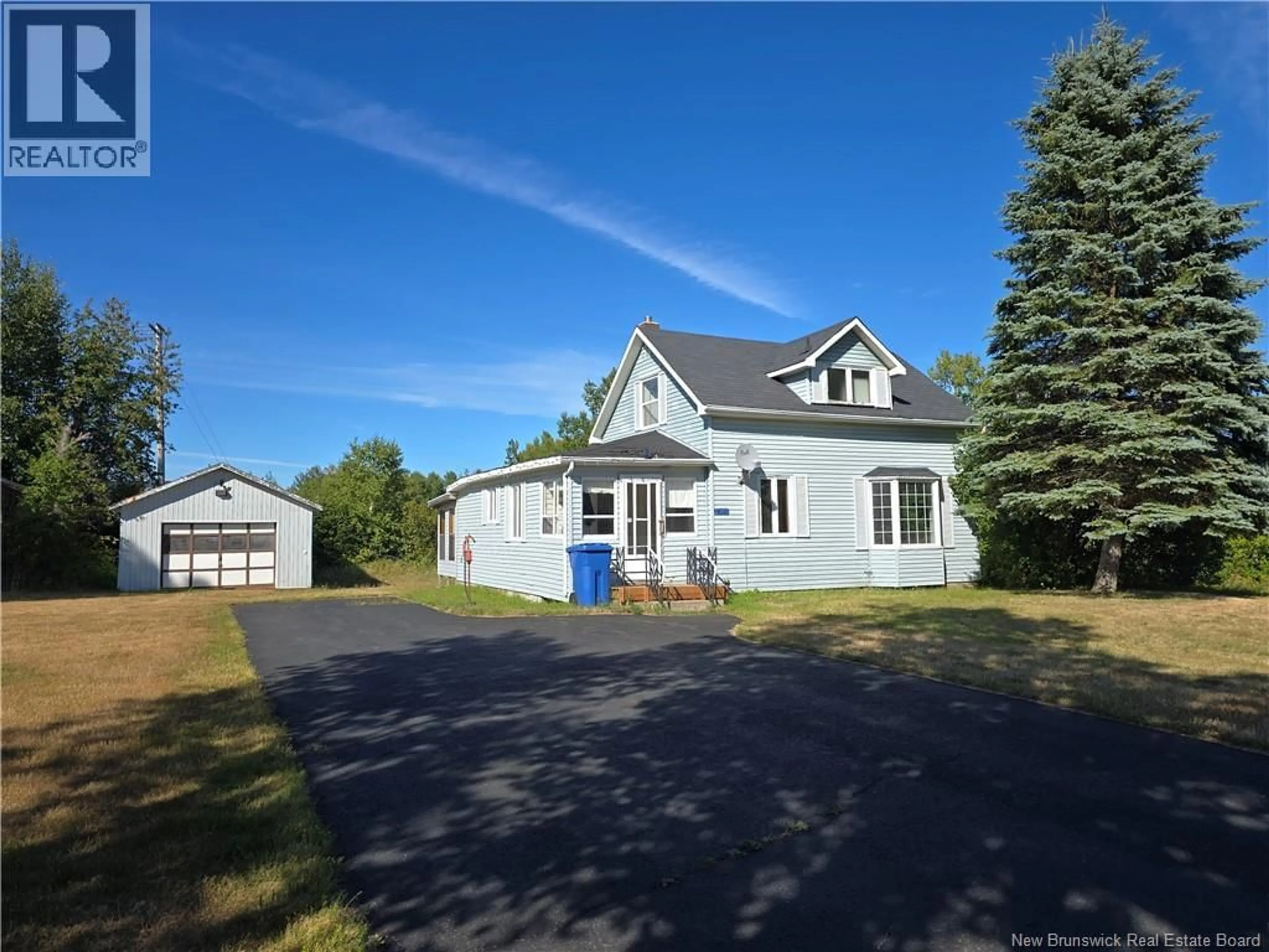 A pic from outside/outdoor area/front of a property/back of a property/a pic from drone, street for 2382 MAIN STREET, Belledune New Brunswick E8G2M6