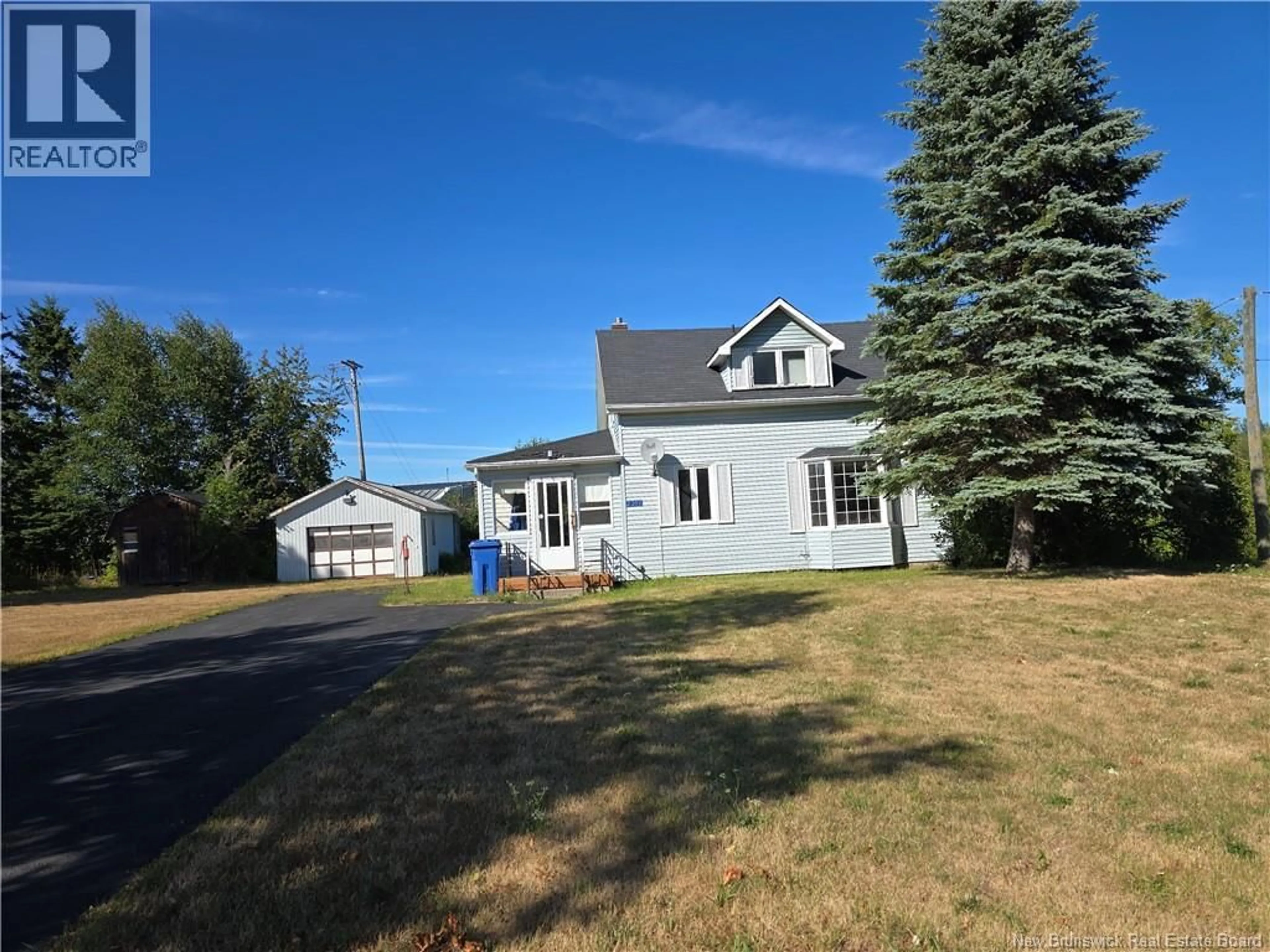 A pic from outside/outdoor area/front of a property/back of a property/a pic from drone, street for 2382 MAIN STREET, Belledune New Brunswick E8G2M6
