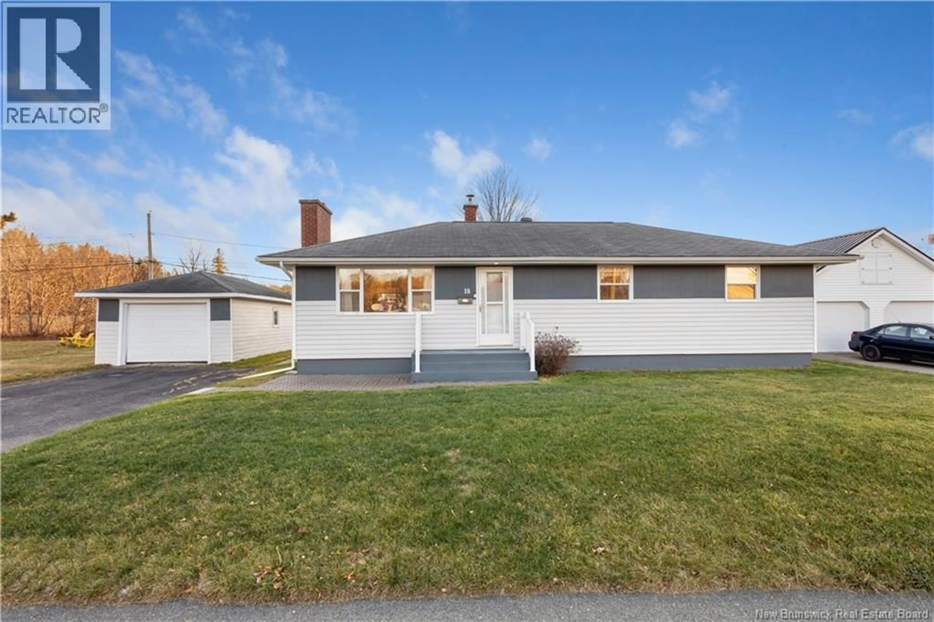 Home with vinyl exterior material, street for 18 PARK DRIVE, Miramichi New Brunswick E1N2Y9