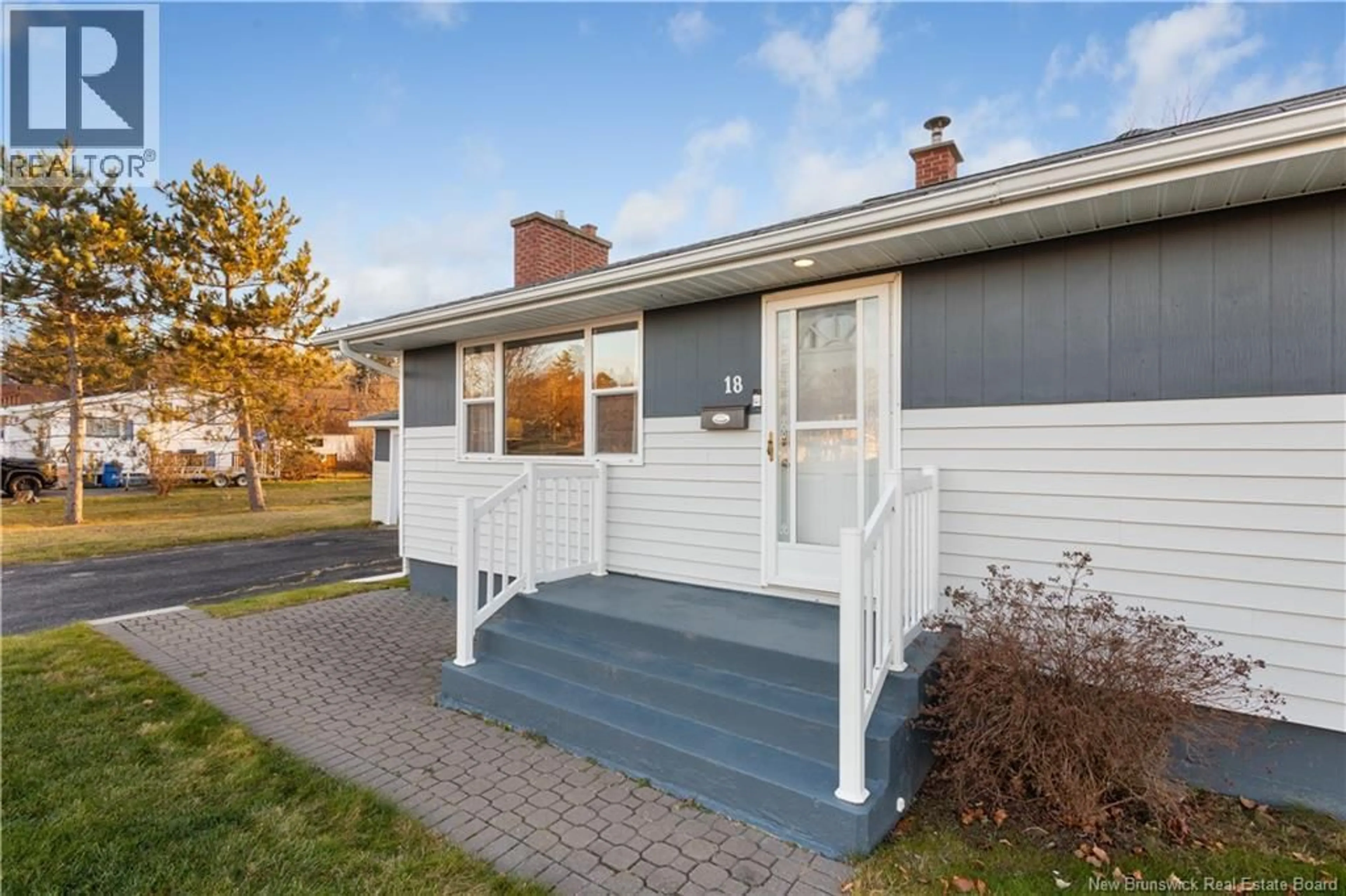 Home with vinyl exterior material, street for 18 PARK DRIVE, Miramichi New Brunswick E1N2Y9