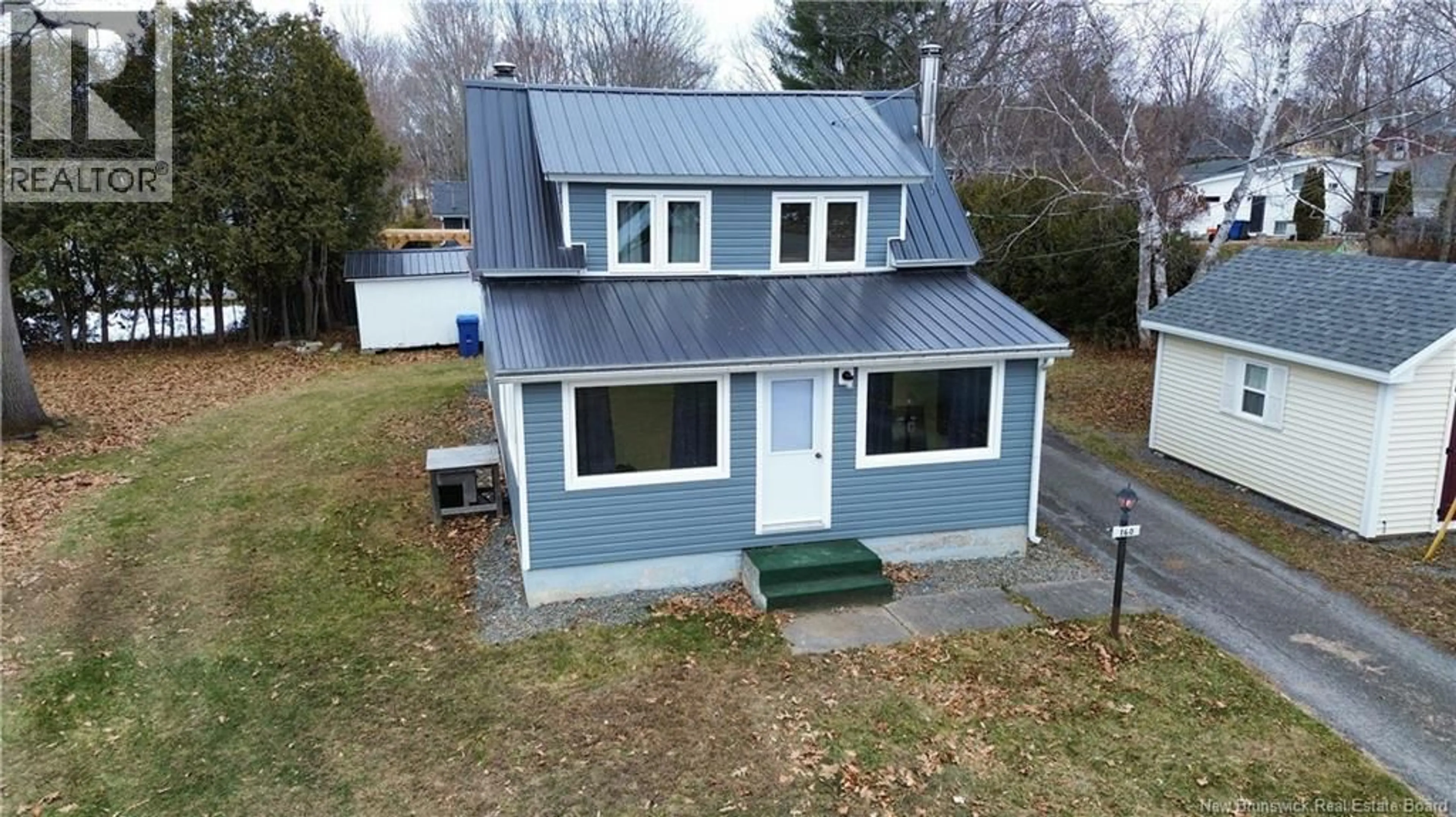 A pic from outside/outdoor area/front of a property/back of a property/a pic from drone, building for 160 ELM STREET, Woodstock New Brunswick E7M1R9