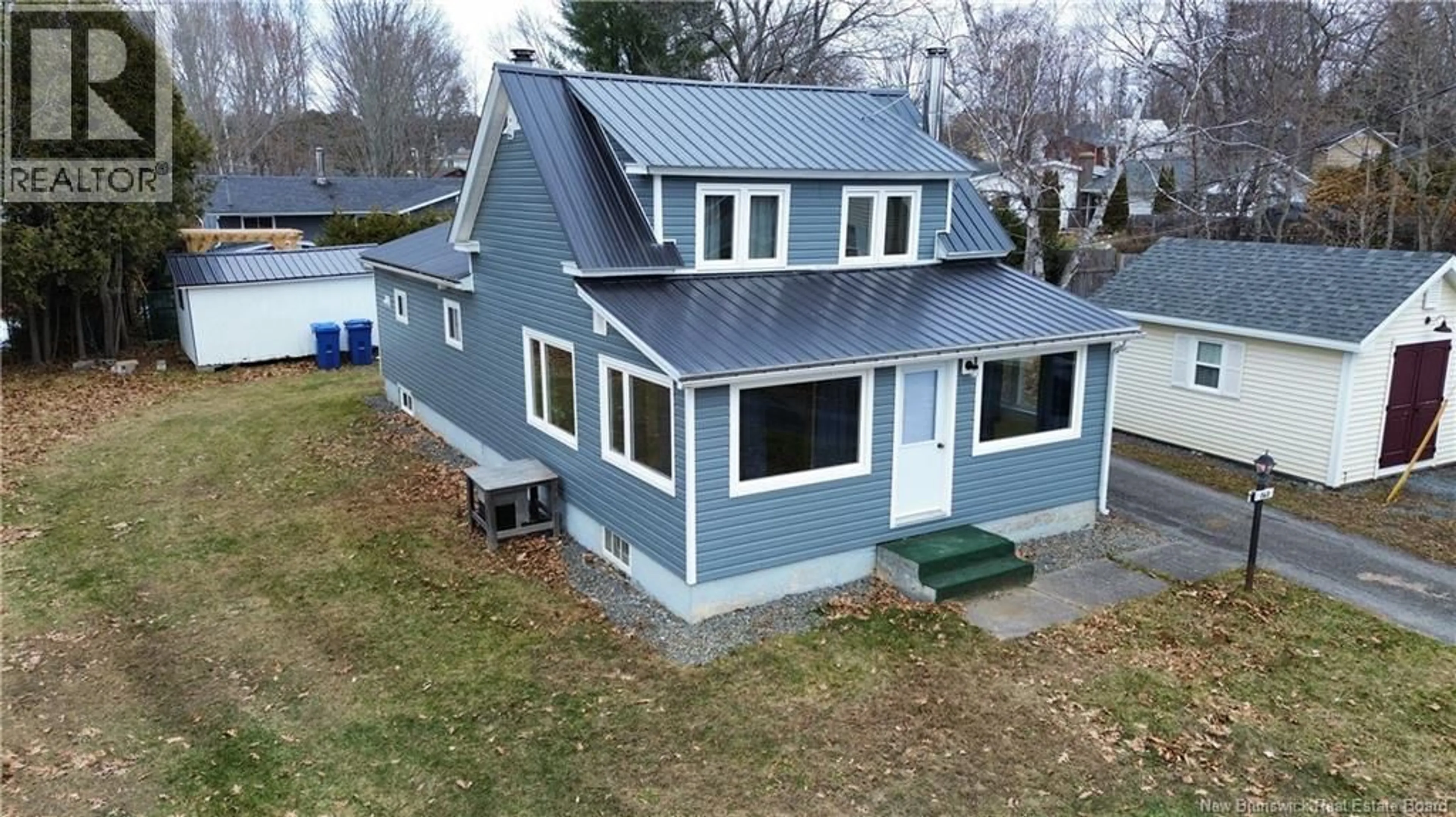 A pic from outside/outdoor area/front of a property/back of a property/a pic from drone, building for 160 ELM STREET, Woodstock New Brunswick E7M1R9