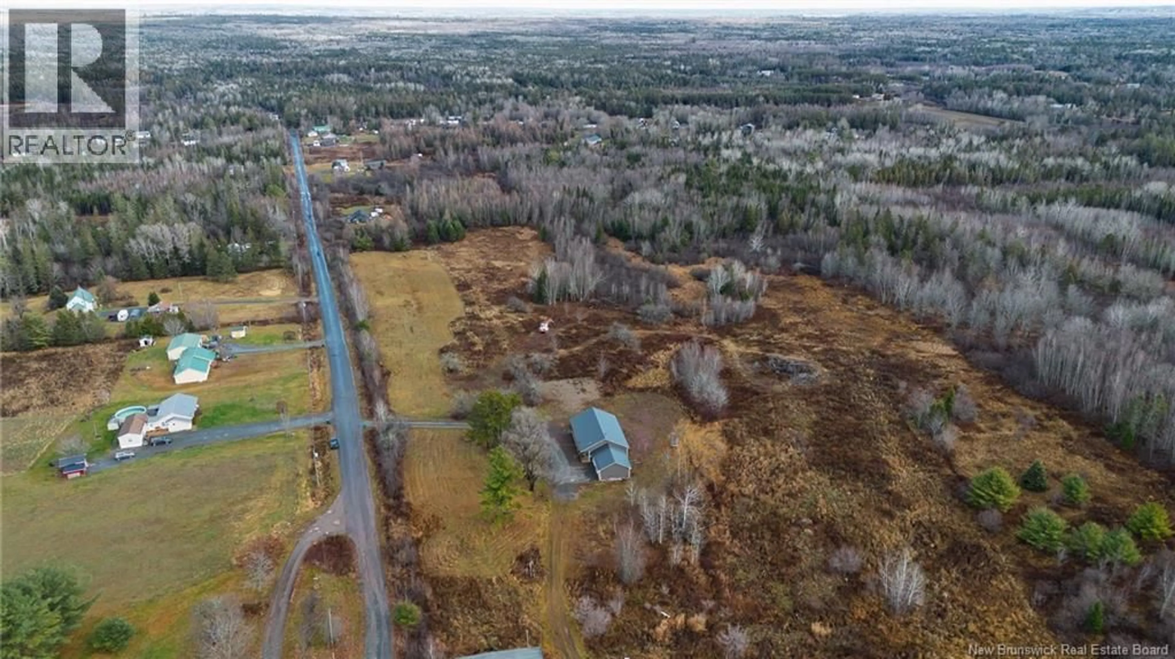 A pic from outside/outdoor area/front of a property/back of a property/a pic from drone, forest/trees view for 165 MOWREY LANE, Nasonworth New Brunswick E3B9G2