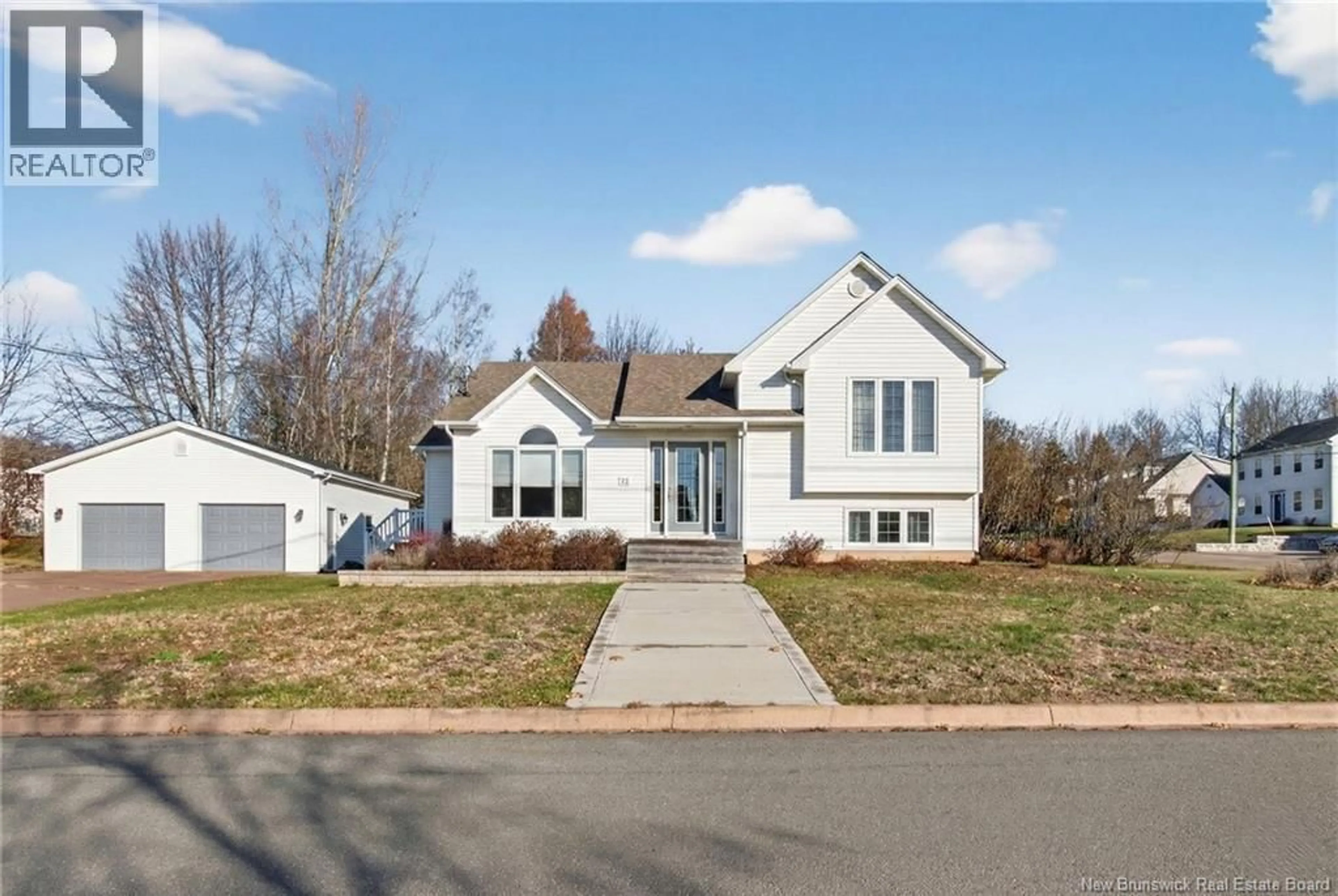 Home with vinyl exterior material, street for 25 CAP PELE COURT, Dieppe New Brunswick E1A6Z2