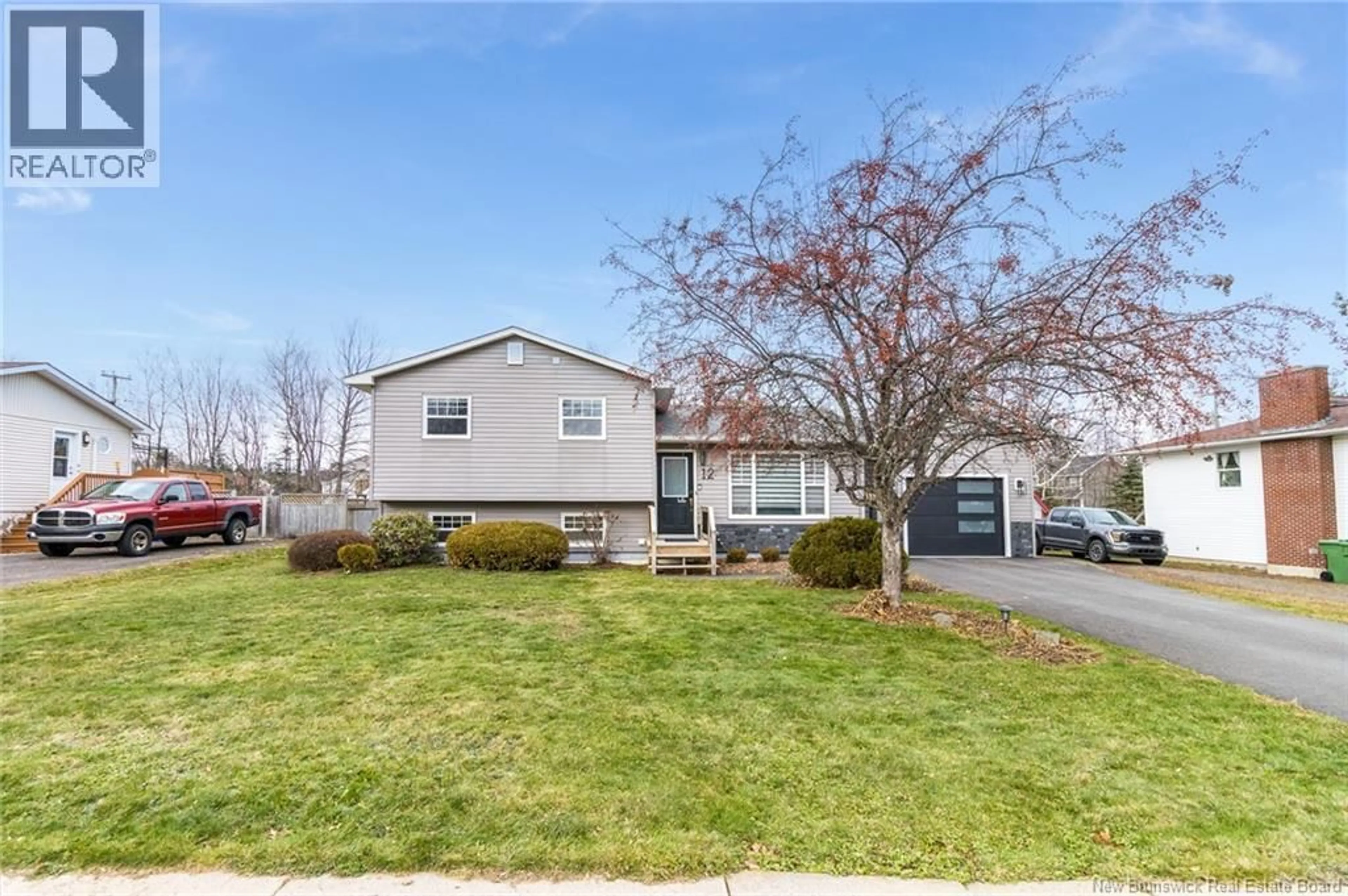 Home with vinyl exterior material, street for 12 DOHERTY STREET, New Maryland New Brunswick E3C1C3