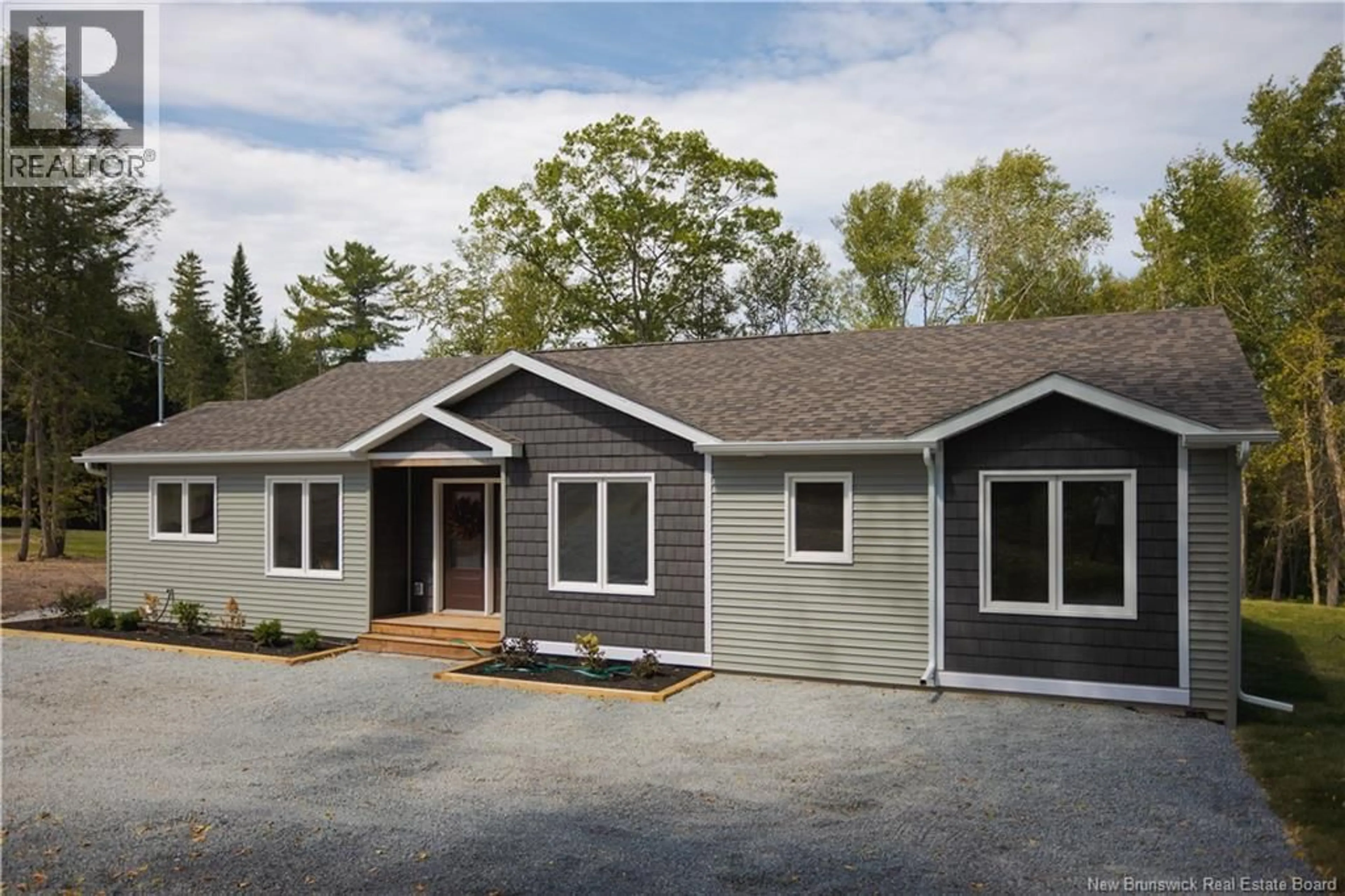 Home with vinyl exterior material, street for 452 COX POINT ROAD, Cumberland Bay New Brunswick E4A3N9