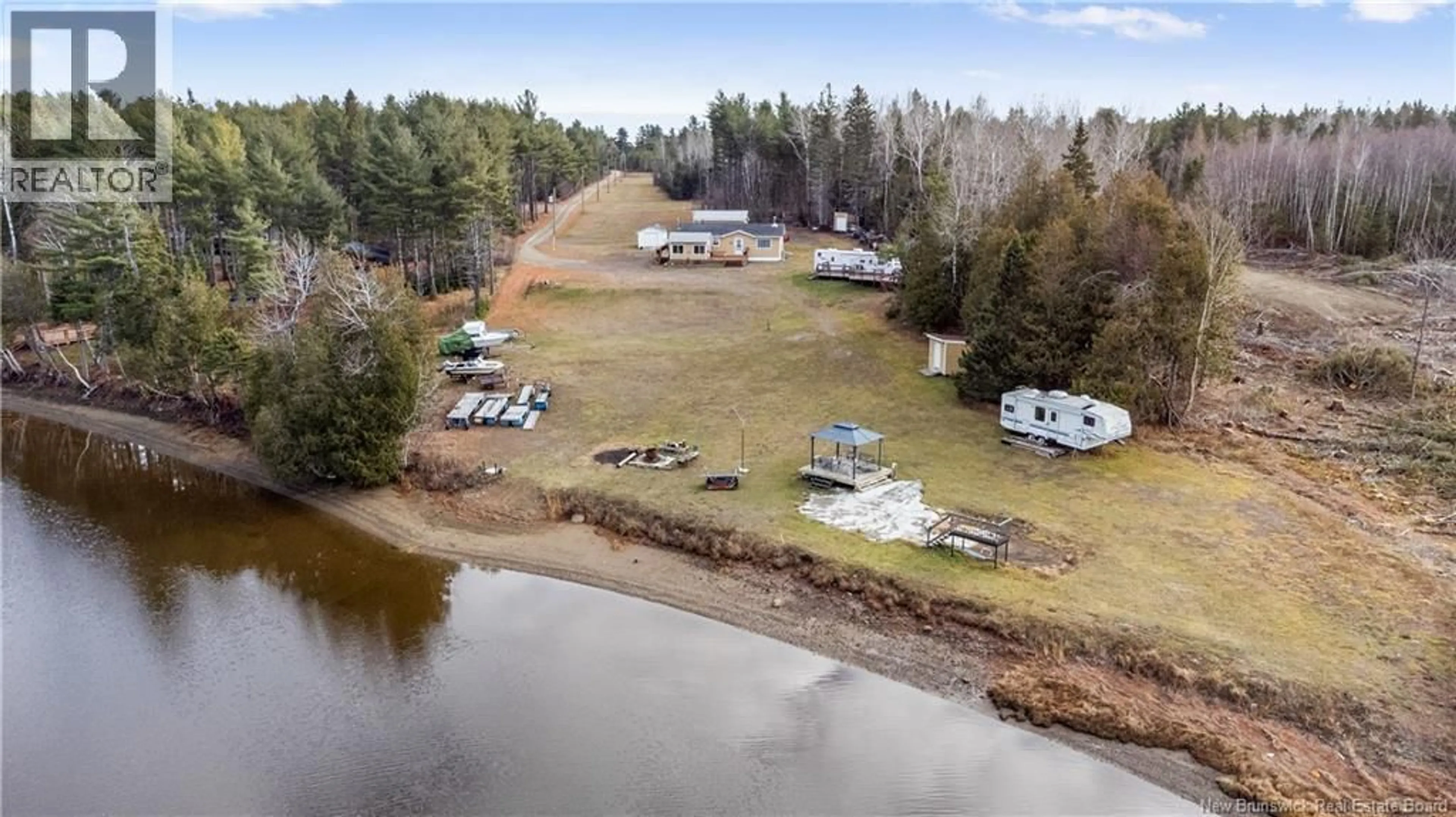 A pic from outside/outdoor area/front of a property/back of a property/a pic from drone, water/lake/river/ocean view for 220 SAINT-CHARLES, Saint-Charles New Brunswick E4W4X4