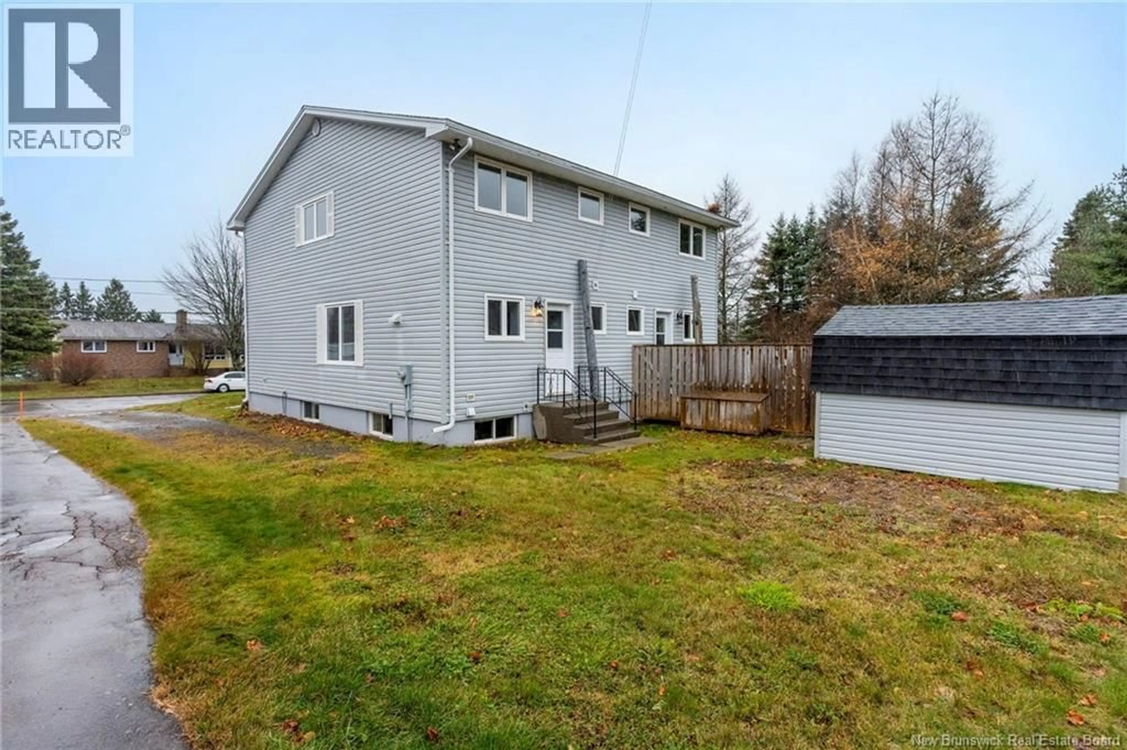 A pic from outside/outdoor area/front of a property/back of a property/a pic from drone, unknown for 31-33 KELLY ROAD, Moncton New Brunswick E1A3R9