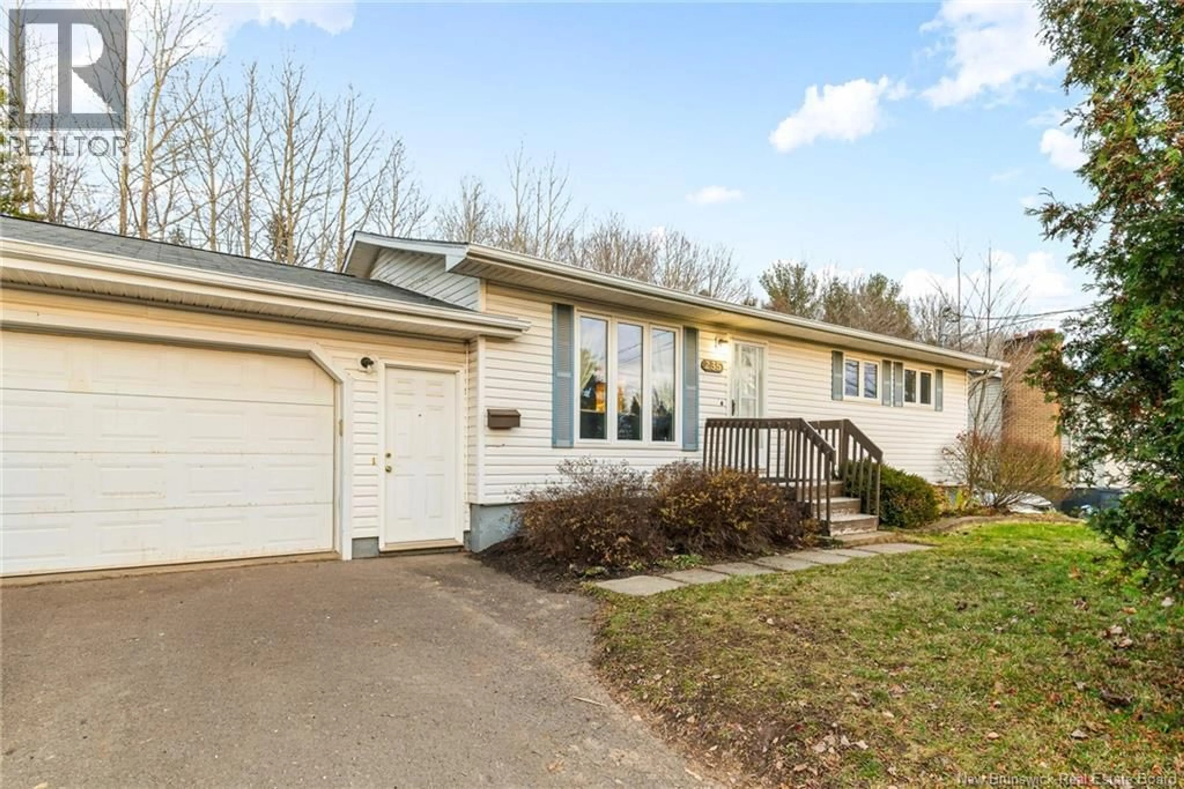 Home with vinyl exterior material, street for 235 PASCAL, Dieppe New Brunswick E1A2C8