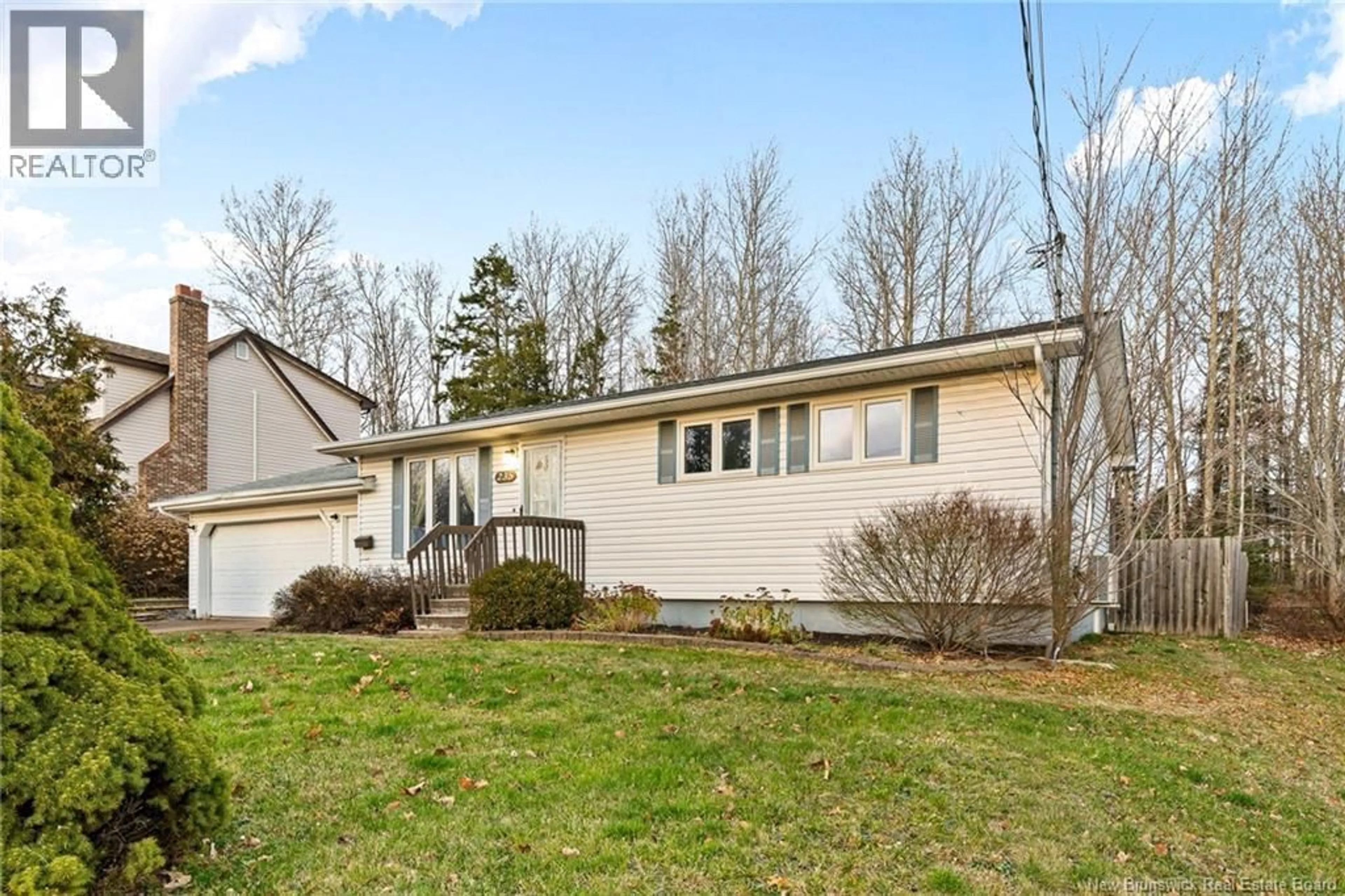 Home with vinyl exterior material, street for 235 PASCAL, Dieppe New Brunswick E1A2C8