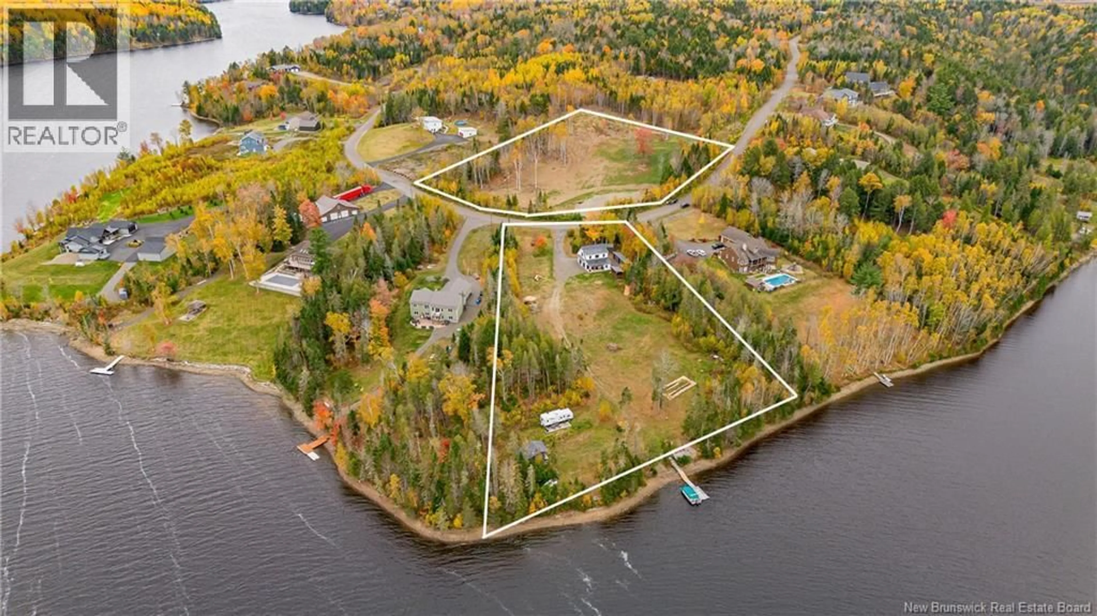 A pic from outside/outdoor area/front of a property/back of a property/a pic from drone, water/lake/river/ocean view for 97 LYNDSAY LANE, New Market New Brunswick E6K0A7