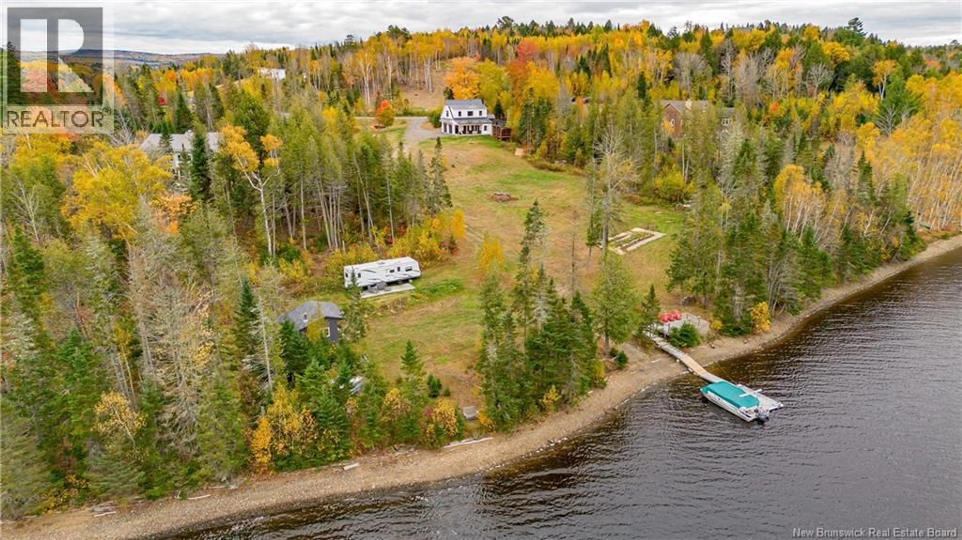 A pic from outside/outdoor area/front of a property/back of a property/a pic from drone, water/lake/river/ocean view for 97 LYNDSAY LANE, New Market New Brunswick E6K0A7