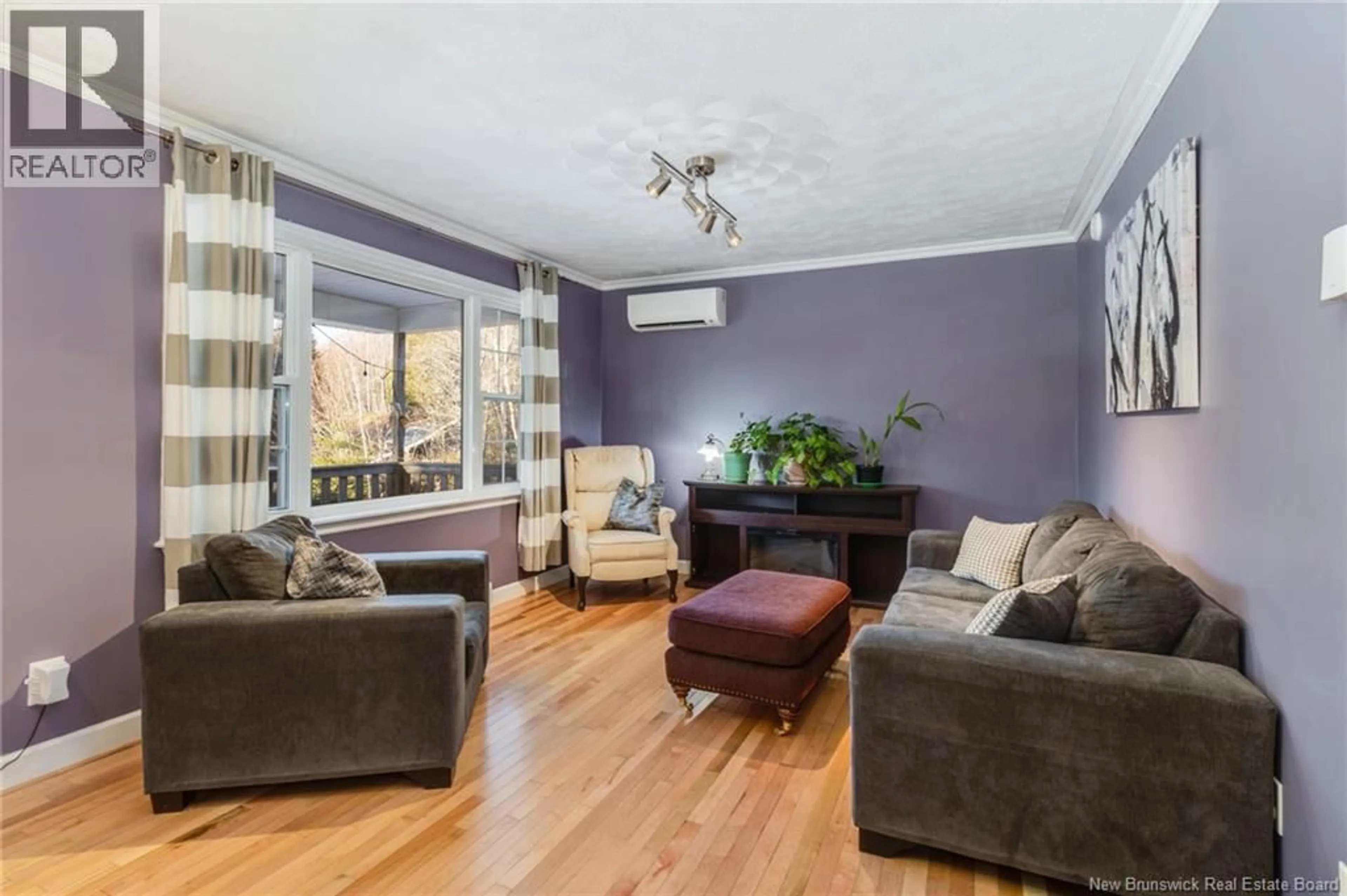 Living room with furniture, wood/laminate floor for 12 LUCY LANE, Mazerolle Settlement New Brunswick E3E6Z2