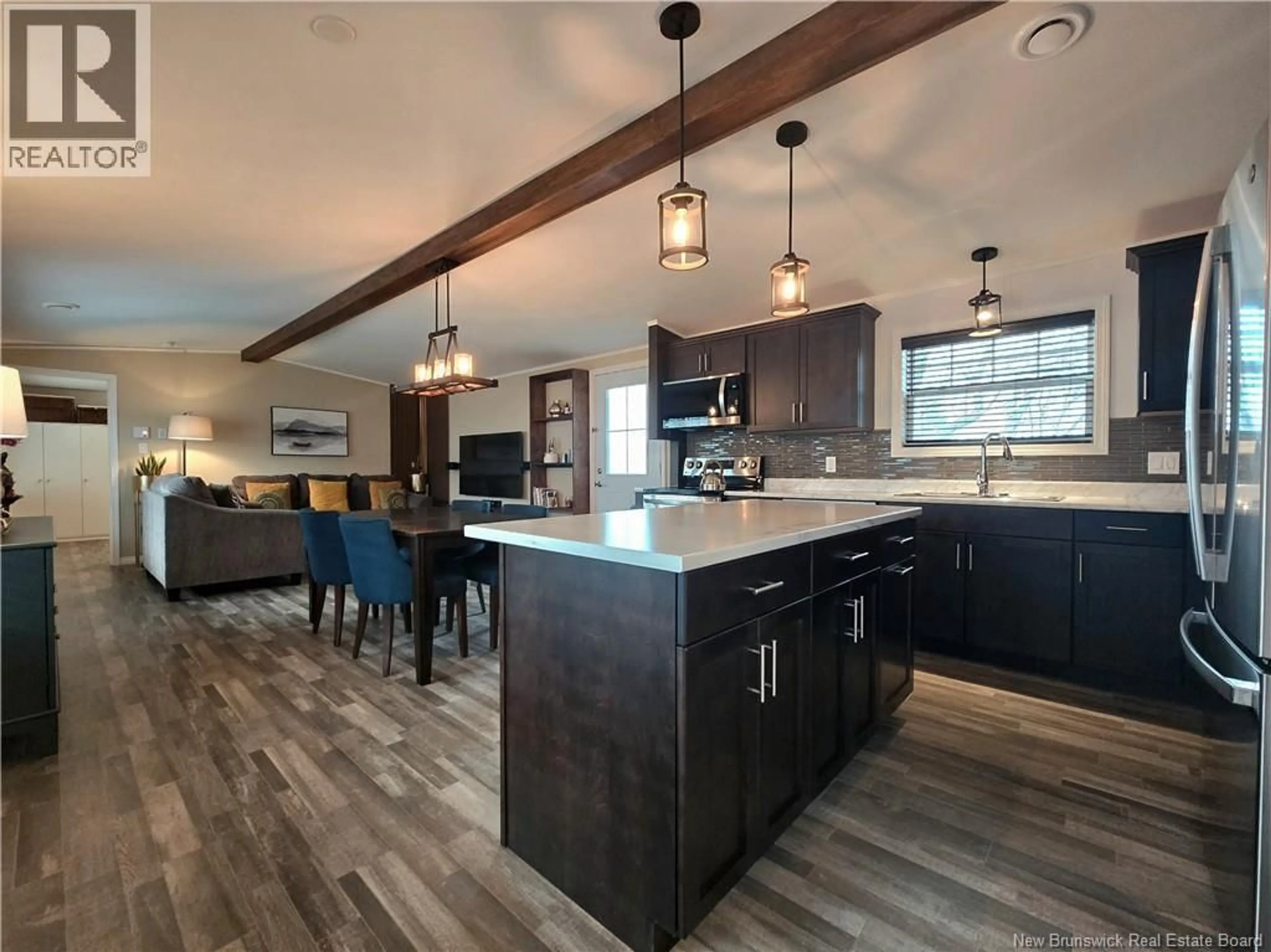 Open concept kitchen, wood/laminate floor for 34 TULIP DRIVE, Riverview New Brunswick E1B5B5