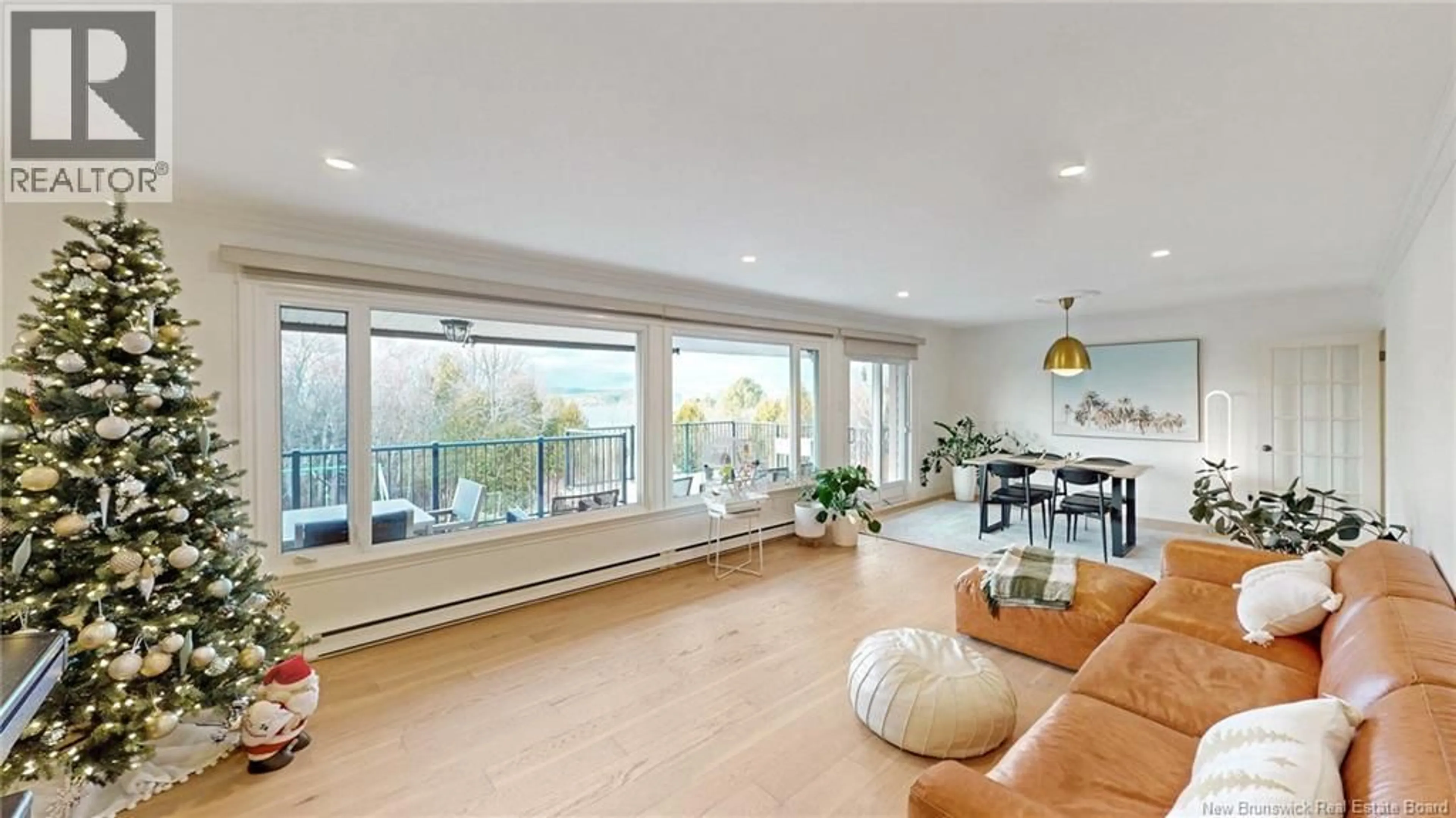 Living room with furniture, wood/laminate floor for 6 BURNETT TERRACE, Rothesay New Brunswick E2H2N1