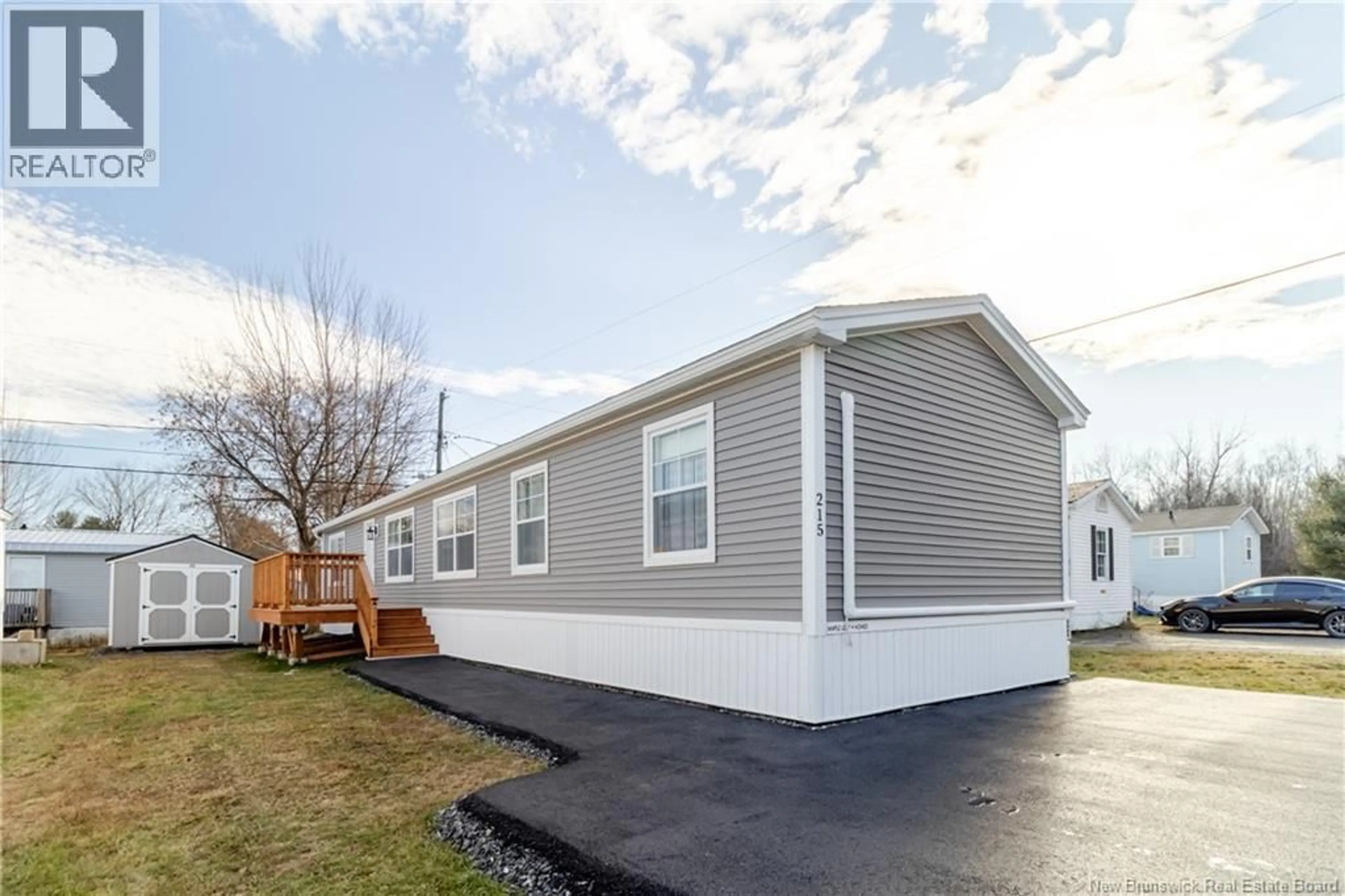 Home with vinyl exterior material, street for 215 MOORE STREET, Fredericton New Brunswick E3A8L6