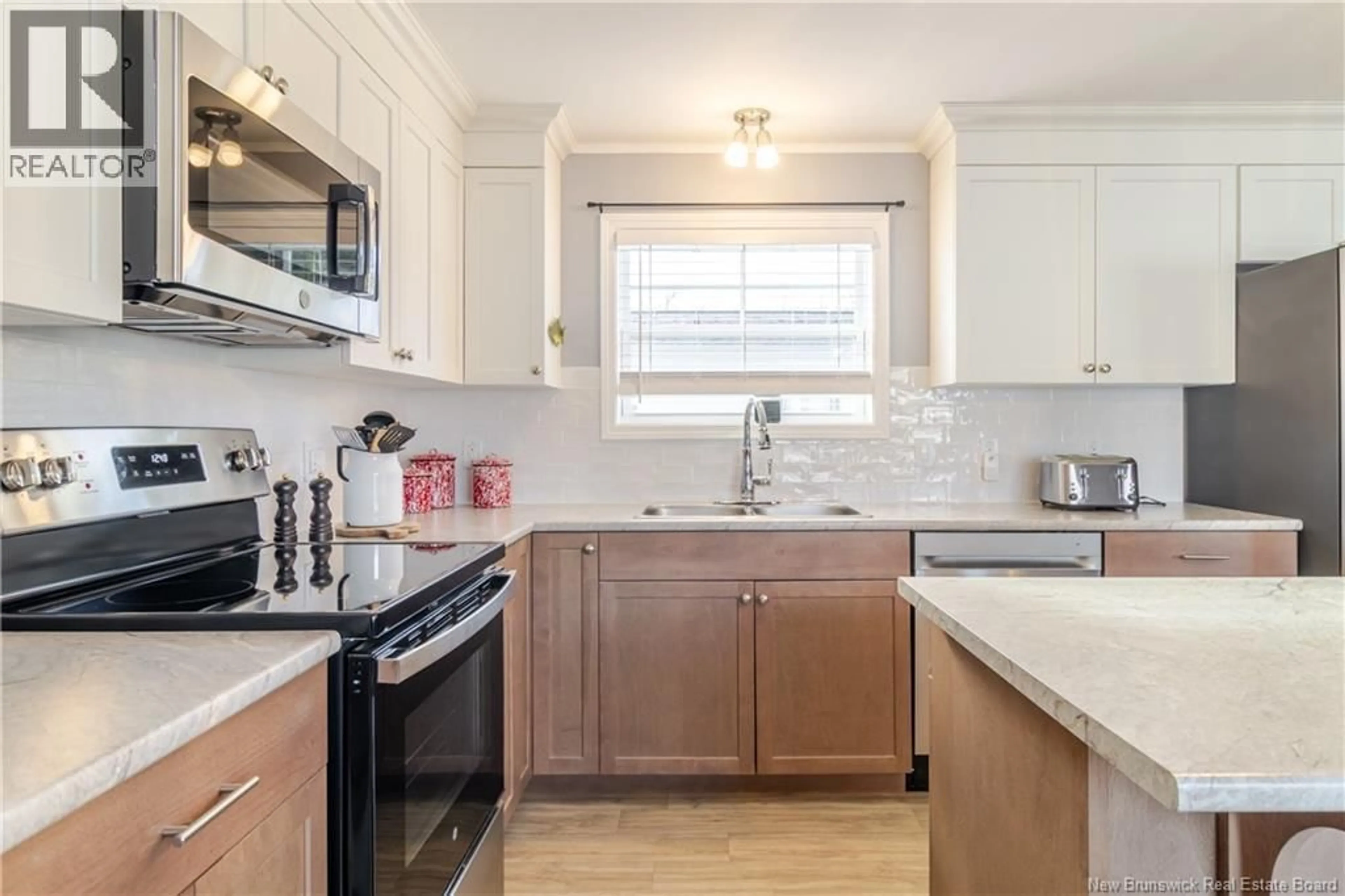 Open concept kitchen, ceramic/tile floor for 215 MOORE STREET, Fredericton New Brunswick E3A8L6