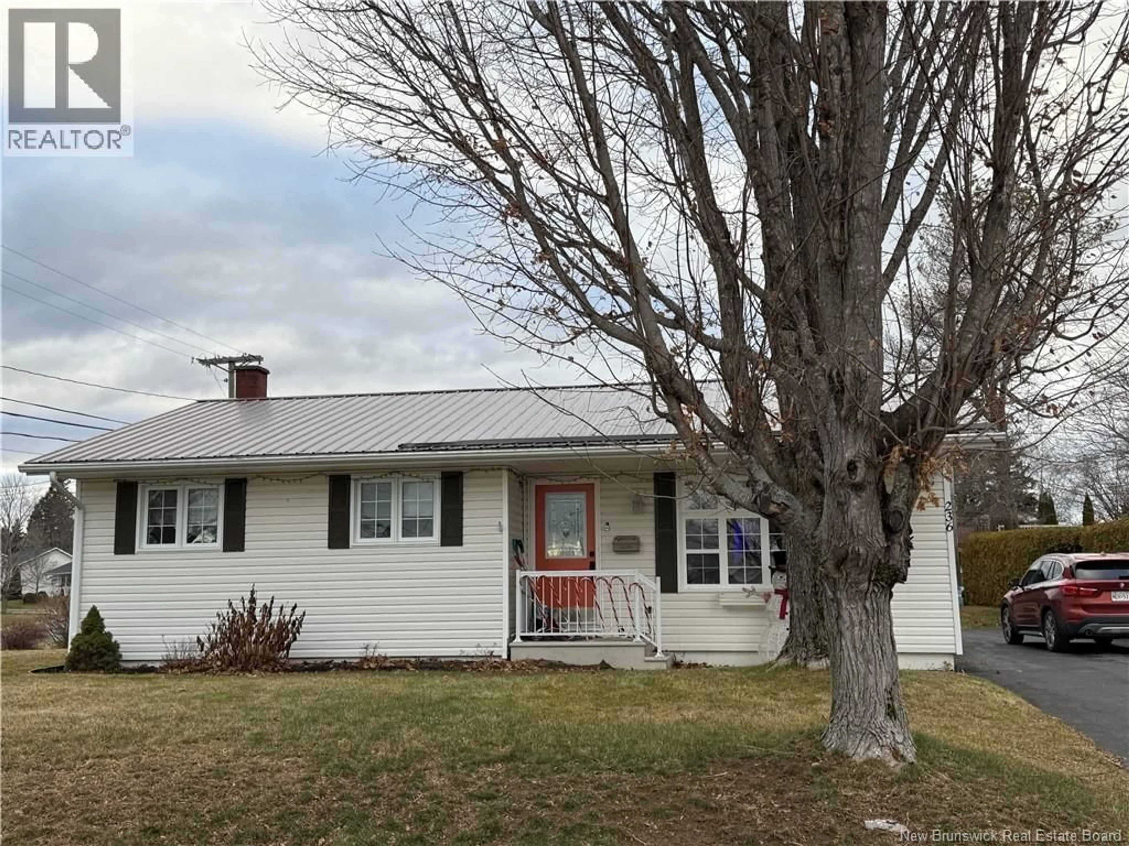 Home with vinyl exterior material, street for 236 NEILSON STREET, Woodstock New Brunswick E7M2H9