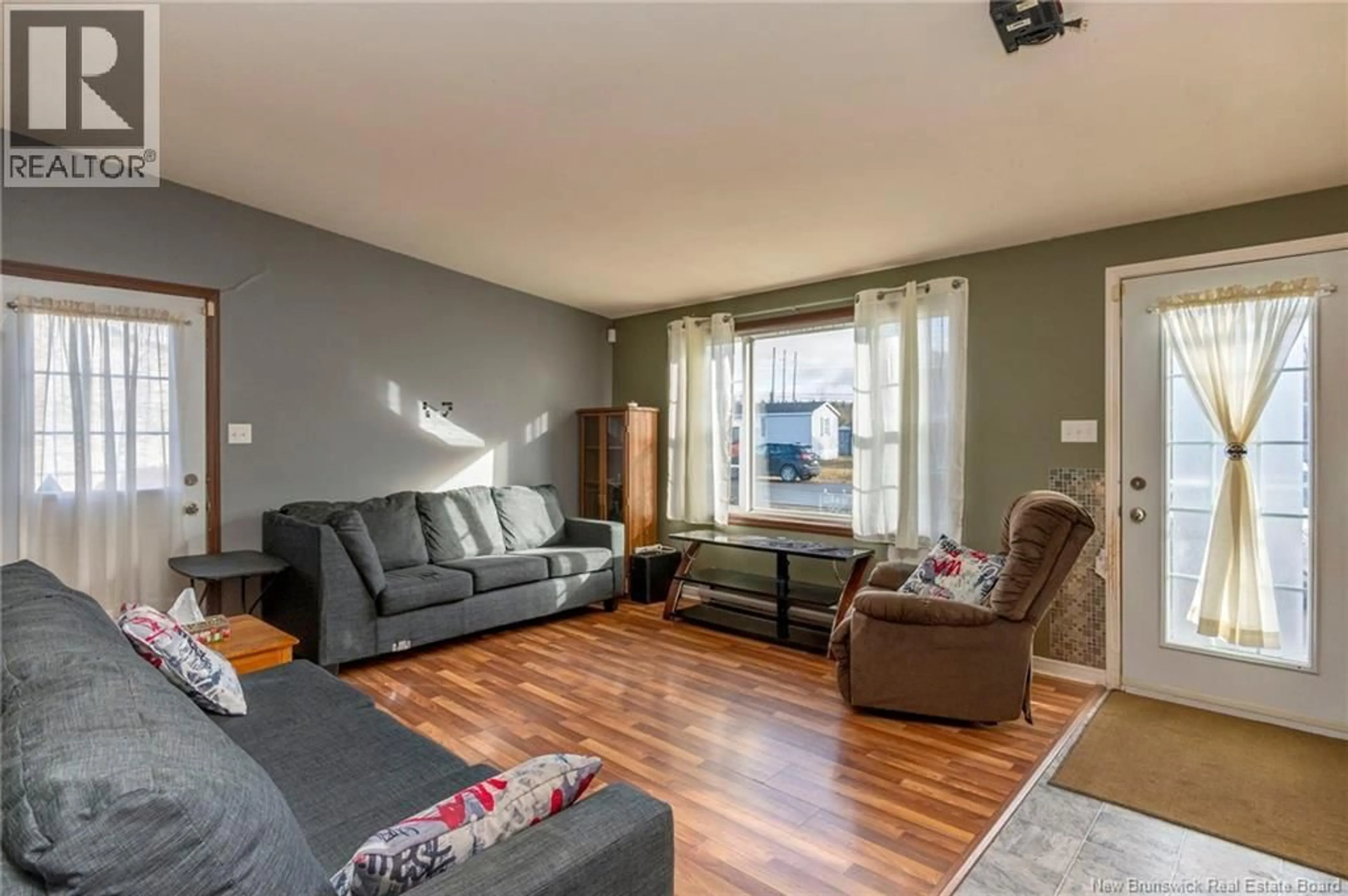 Living room with furniture, wood/laminate floor for 8 ANGUS LANE, Riverview New Brunswick E1B5L9