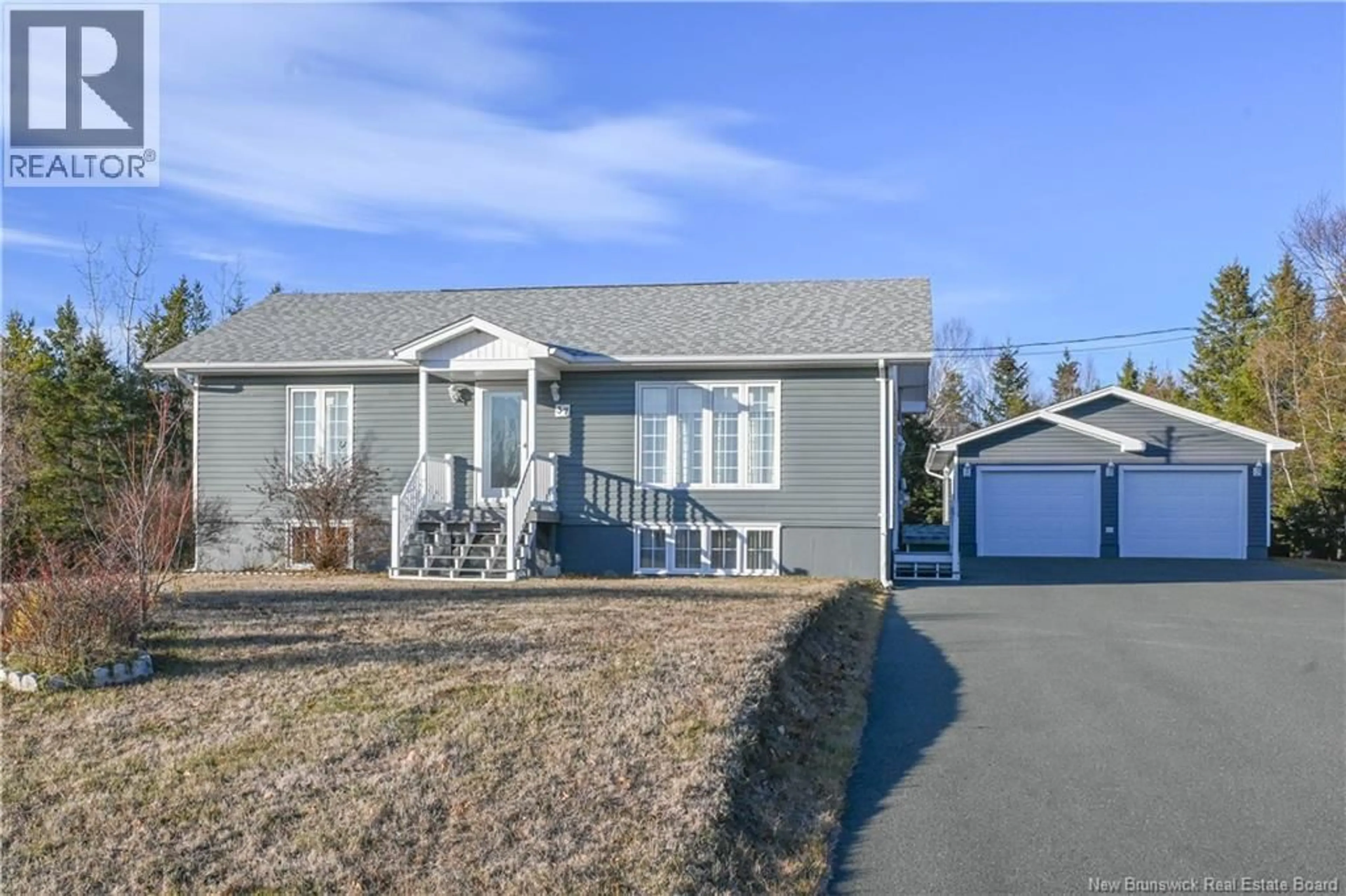 Home with vinyl exterior material, street for 37 RUE SAINT-PIERRE STREET, Rivière-À-La-Truite New Brunswick E1X3L6