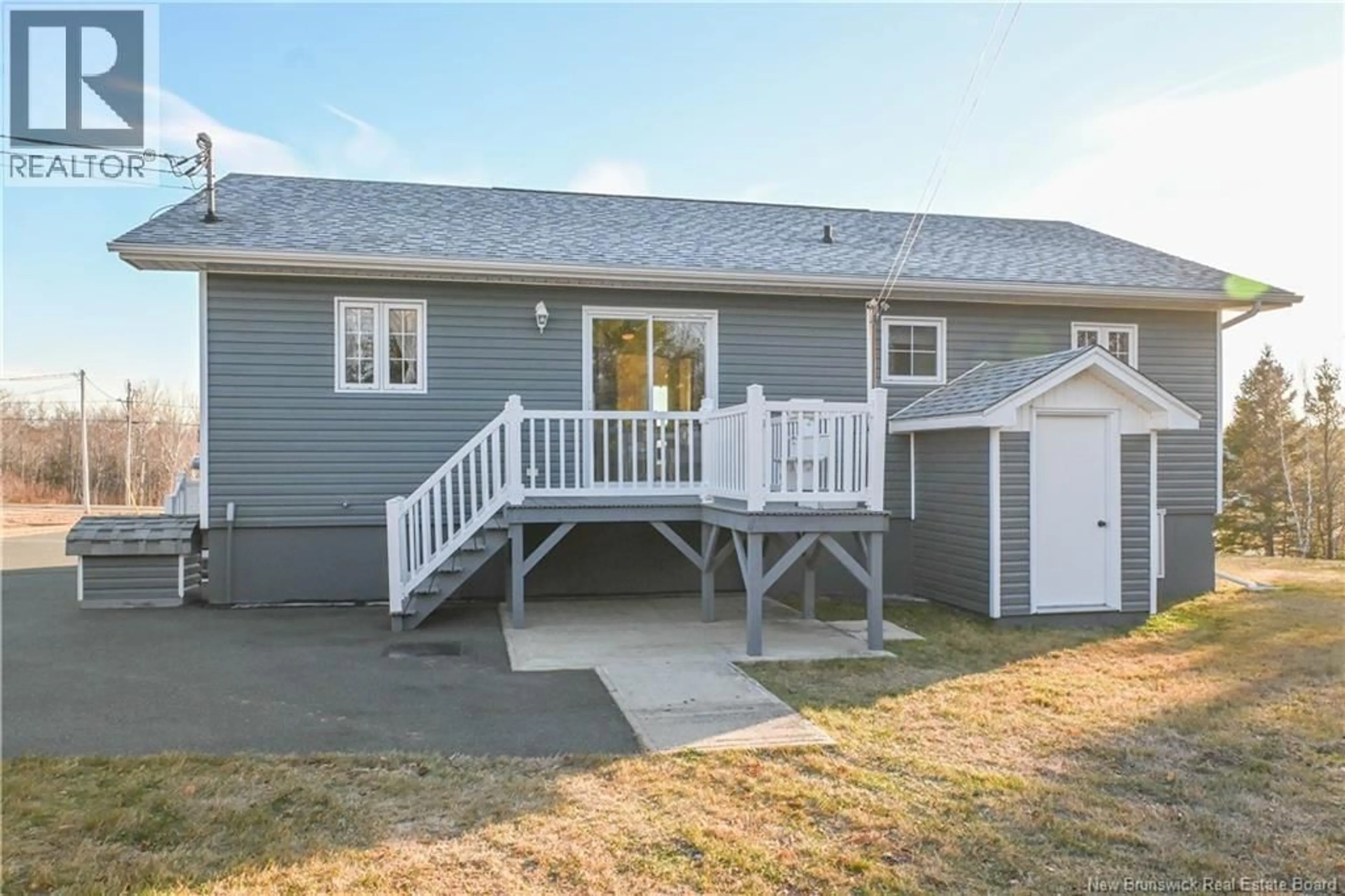 Home with vinyl exterior material, street for 37 RUE SAINT-PIERRE STREET, Rivière-À-La-Truite New Brunswick E1X3L6