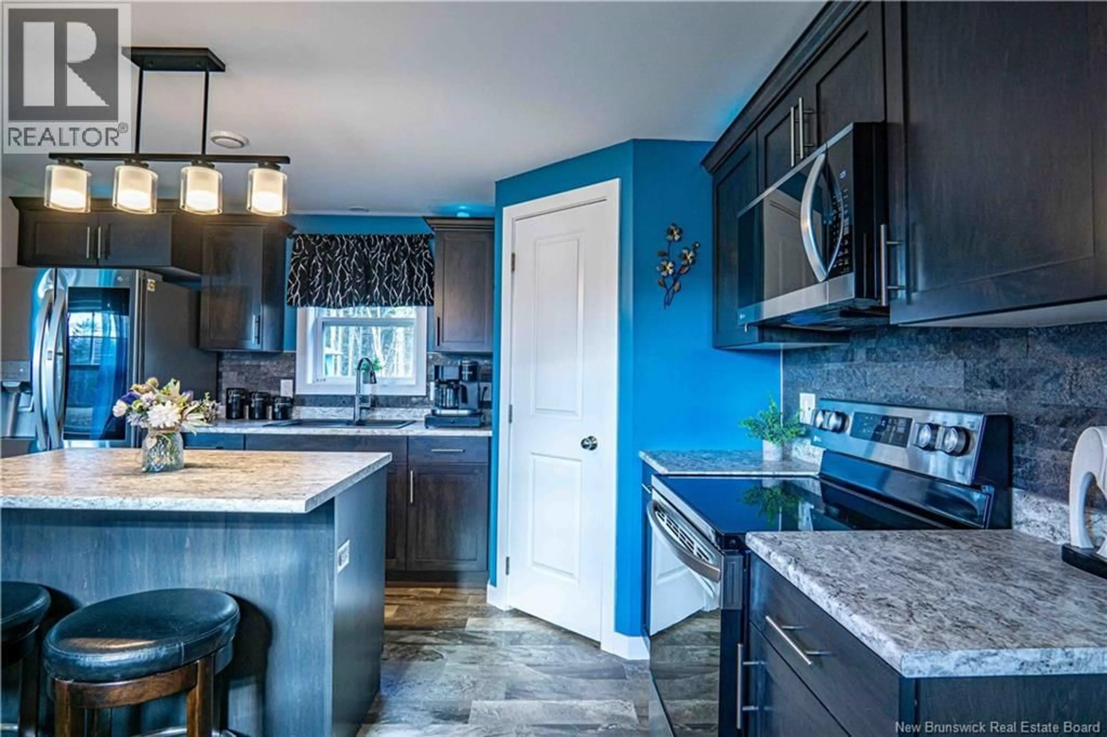 Open concept kitchen, ceramic/tile floor for 9 POPEYE COURT, Waterville New Brunswick E2V0L6