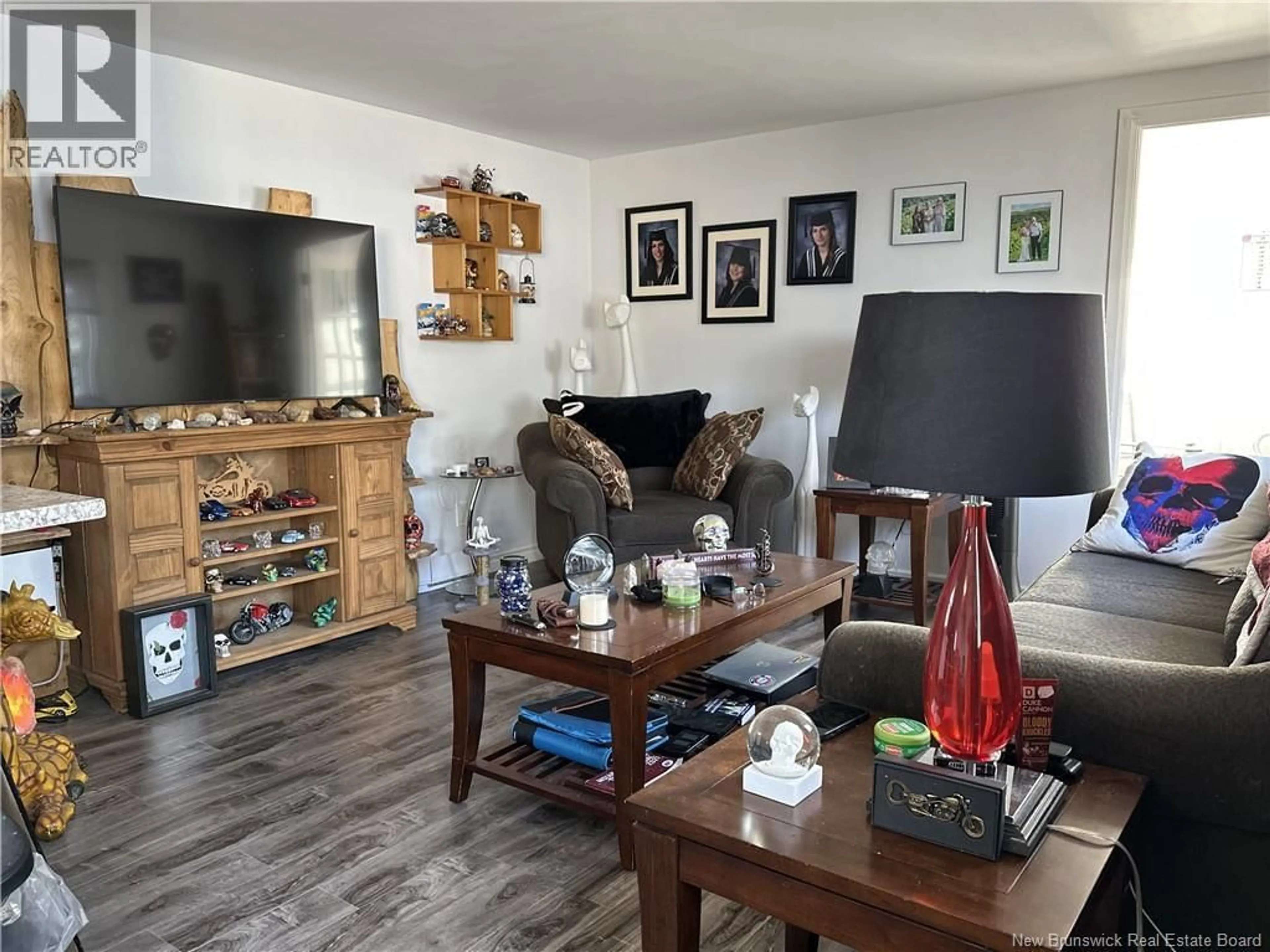 Living room with furniture, wood/laminate floor for 25 GEORGE WILLIAM, Moncton New Brunswick E1E3T7