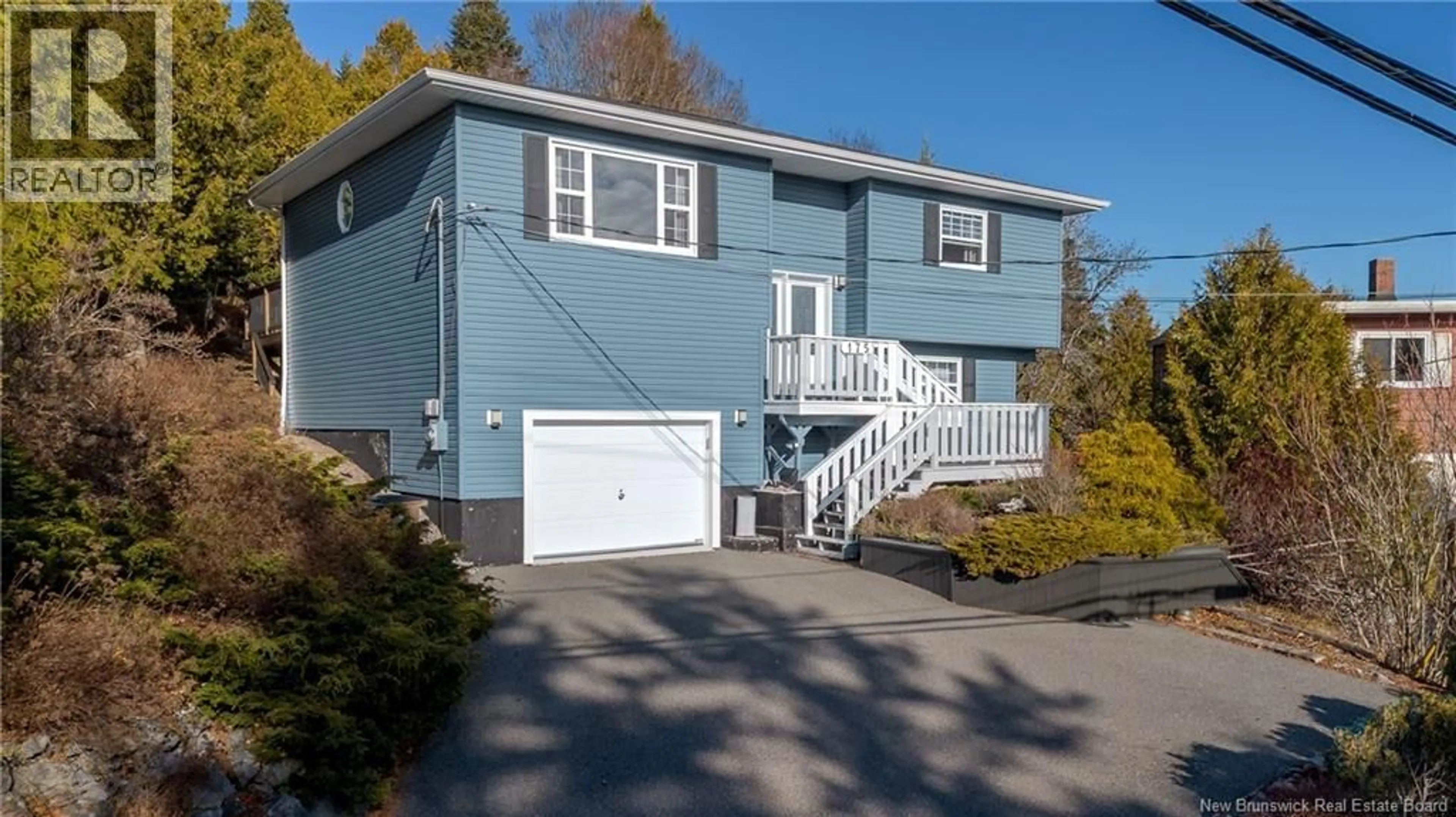 Home with vinyl exterior material, street for 175 HIGHLAND ROAD, Saint John New Brunswick E2K1P8
