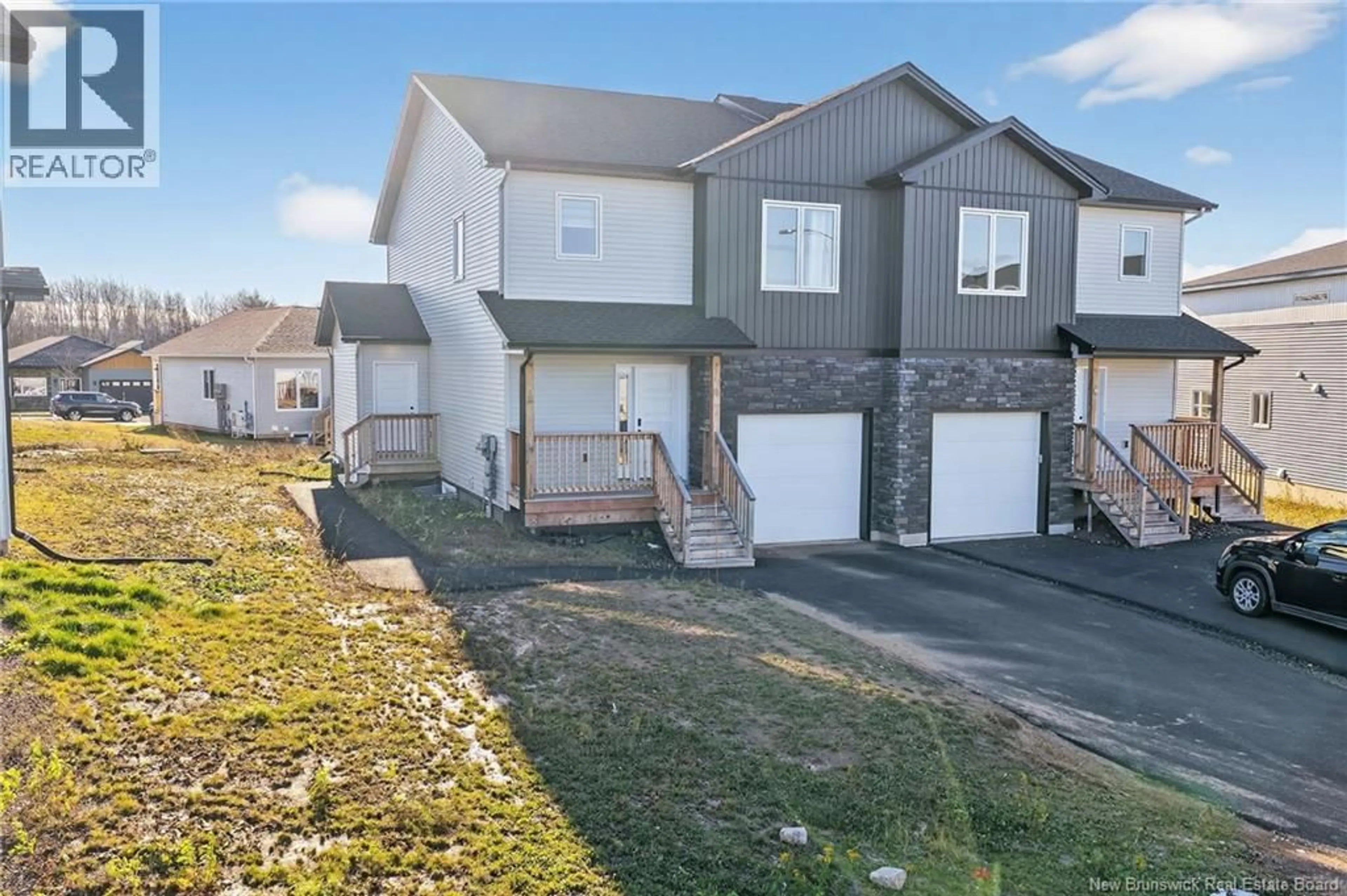 A pic from outside/outdoor area/front of a property/back of a property/a pic from drone, street for 18 SOLAIRE PASSAGE, Moncton New Brunswick E1A7V1