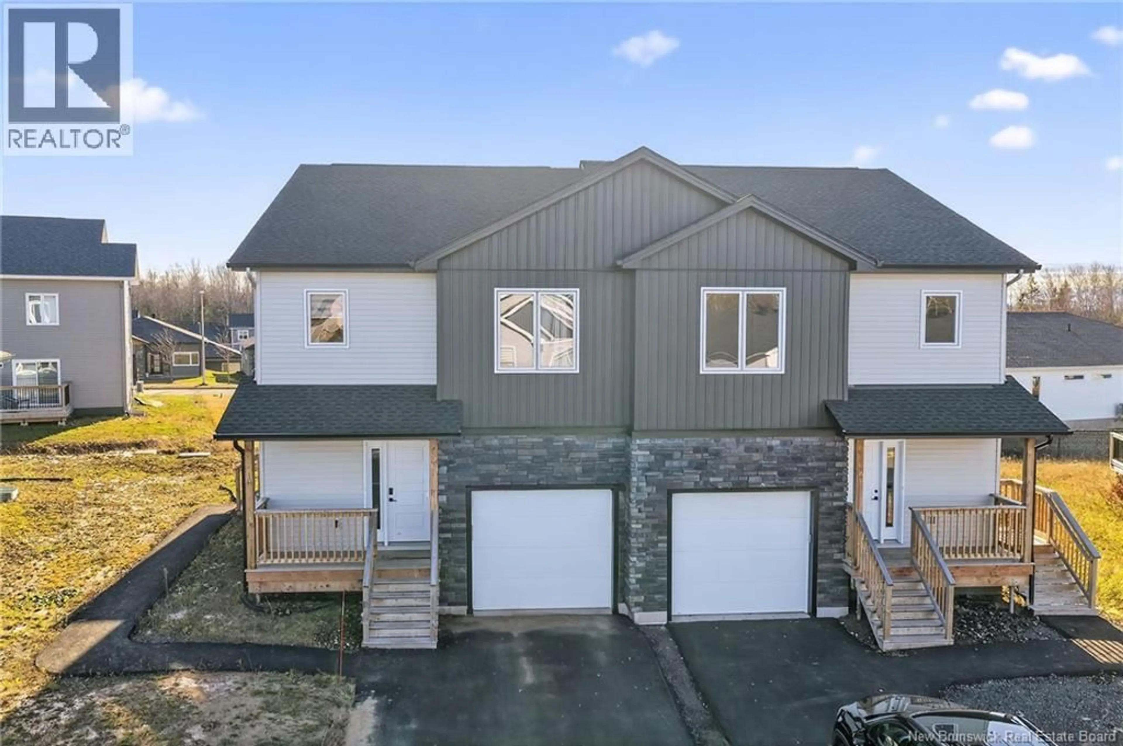 A pic from outside/outdoor area/front of a property/back of a property/a pic from drone, building for 18 SOLAIRE PASSAGE, Moncton New Brunswick E1A7V1