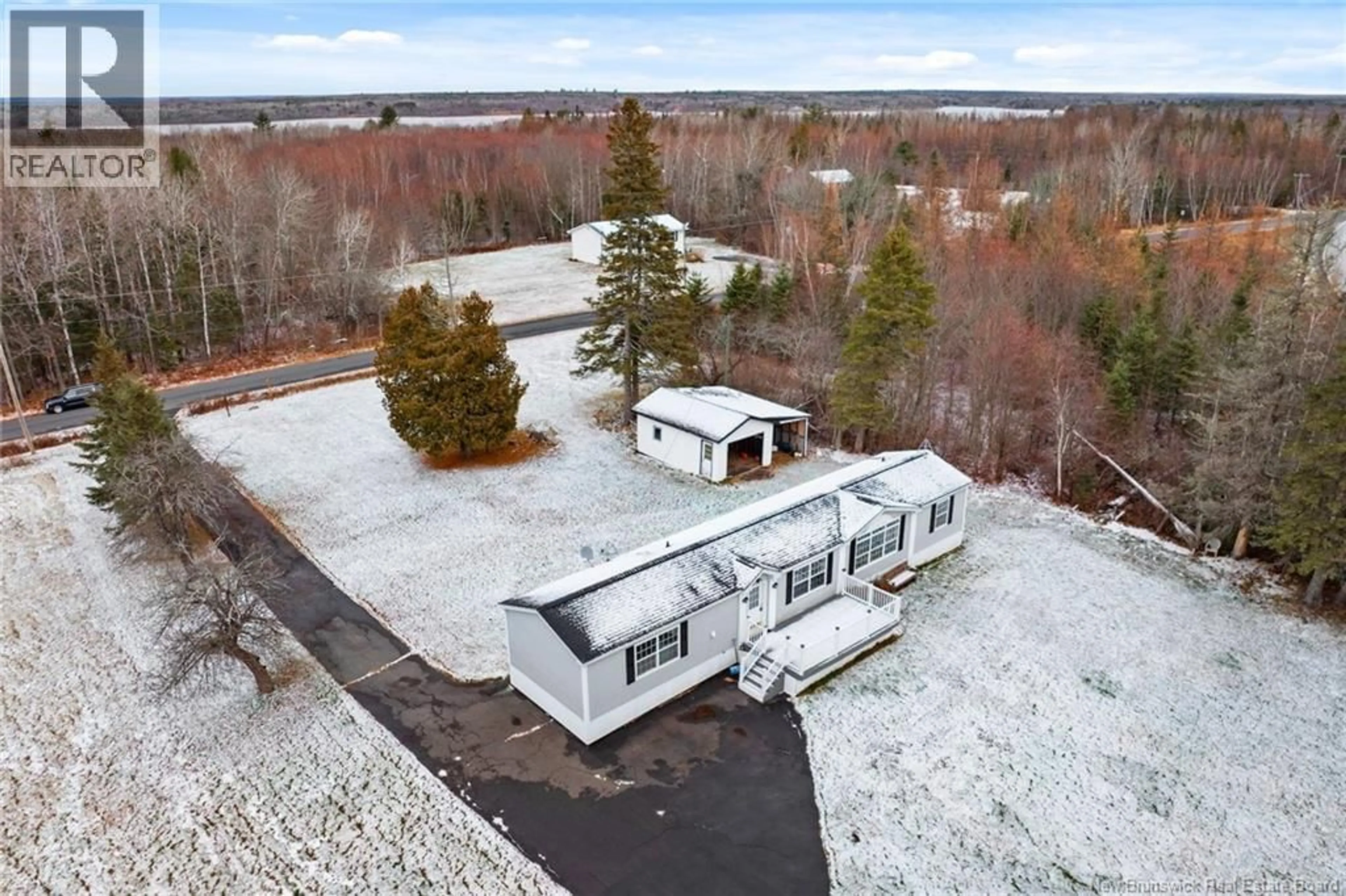 A pic from outside/outdoor area/front of a property/back of a property/a pic from drone, unknown for 19 COX POINT ROAD, Cumberland Bay New Brunswick E4A2X1