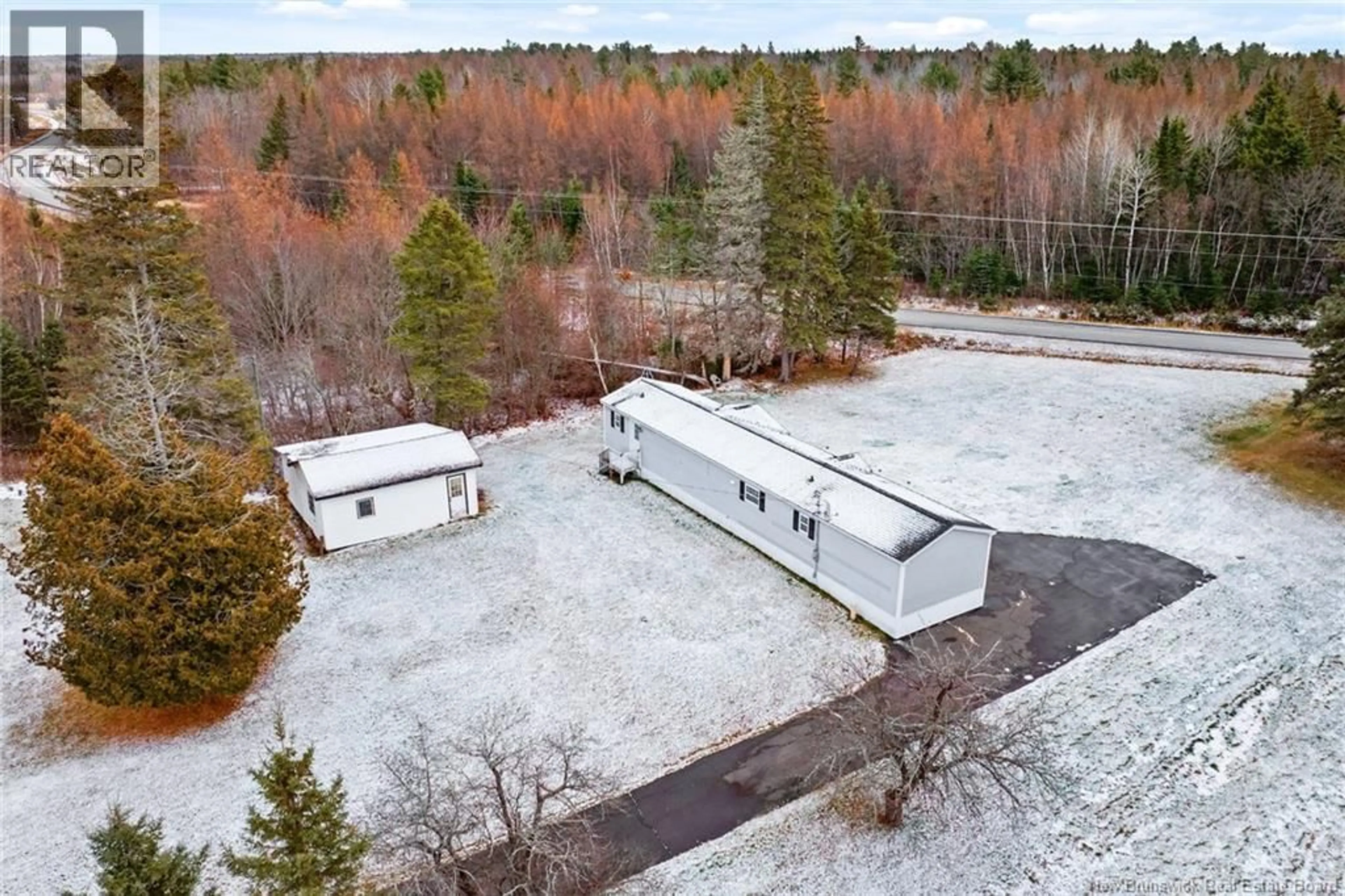 A pic from outside/outdoor area/front of a property/back of a property/a pic from drone, unknown for 19 COX POINT ROAD, Cumberland Bay New Brunswick E4A2X1