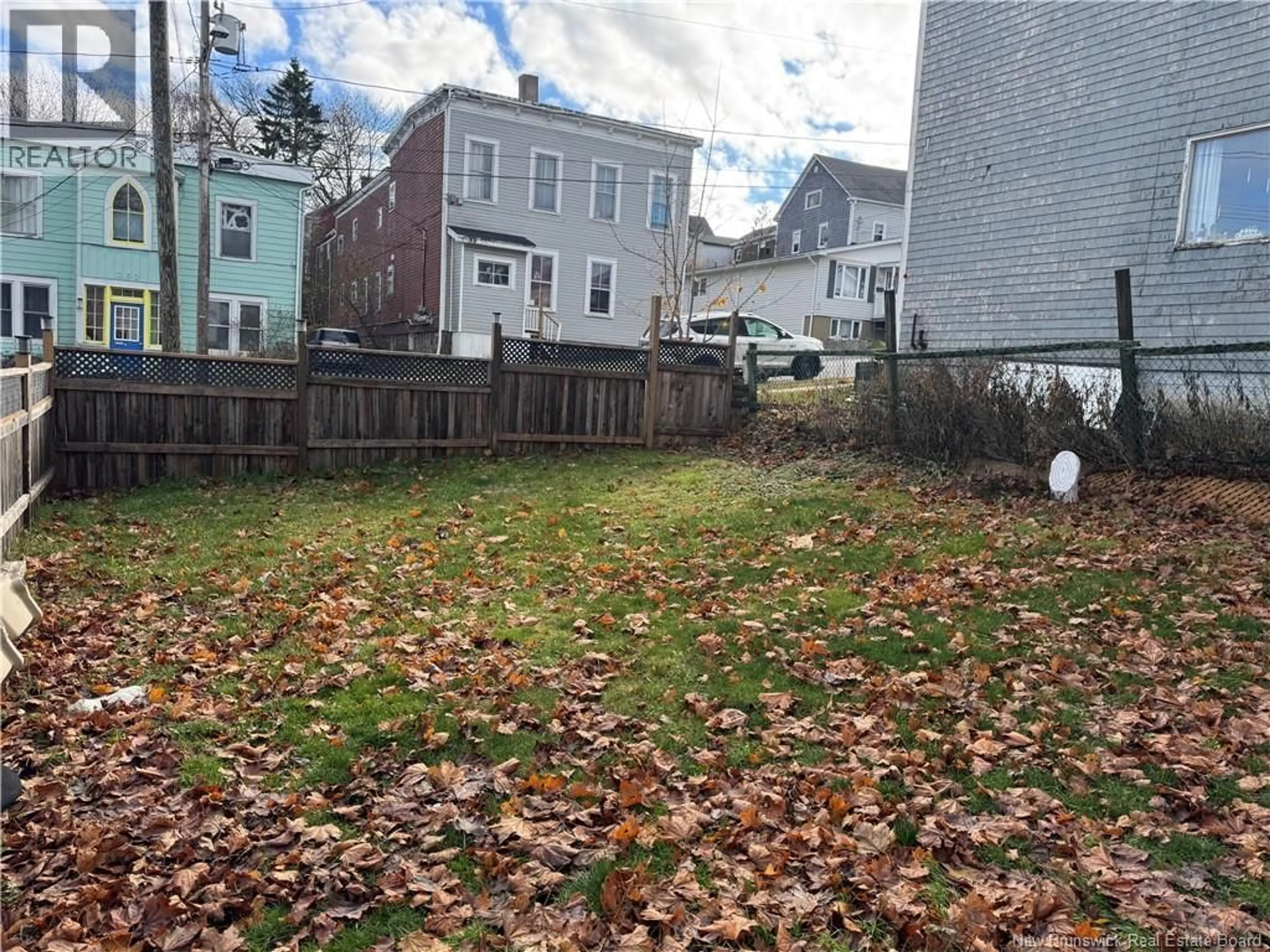 A pic from outside/outdoor area/front of a property/back of a property/a pic from drone, street for 229 RODNEY STREET, Saint John New Brunswick E2M1X5