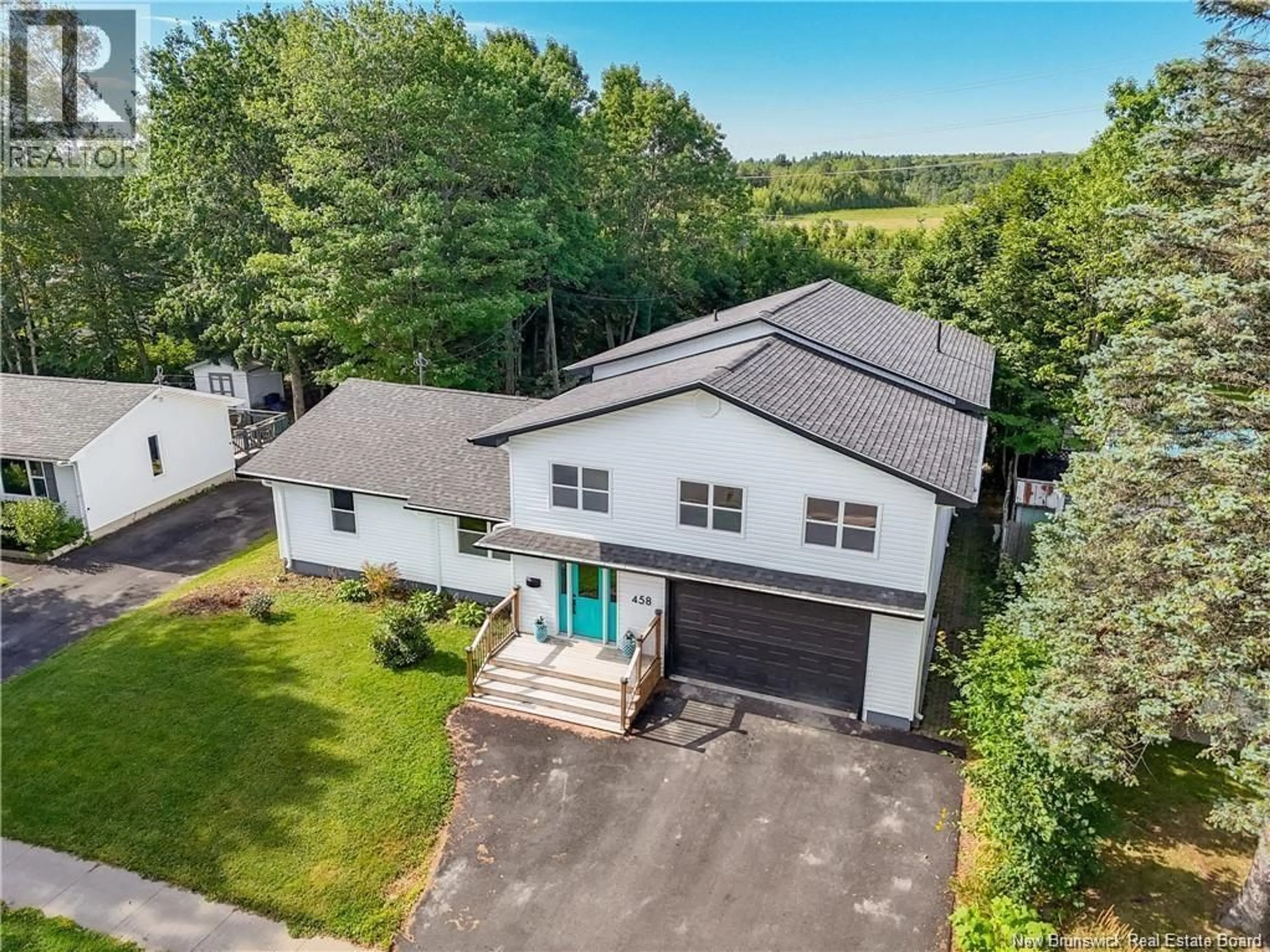 A pic from outside/outdoor area/front of a property/back of a property/a pic from drone, street for 458 WETMORE ROAD, Fredericton New Brunswick E3B5V1