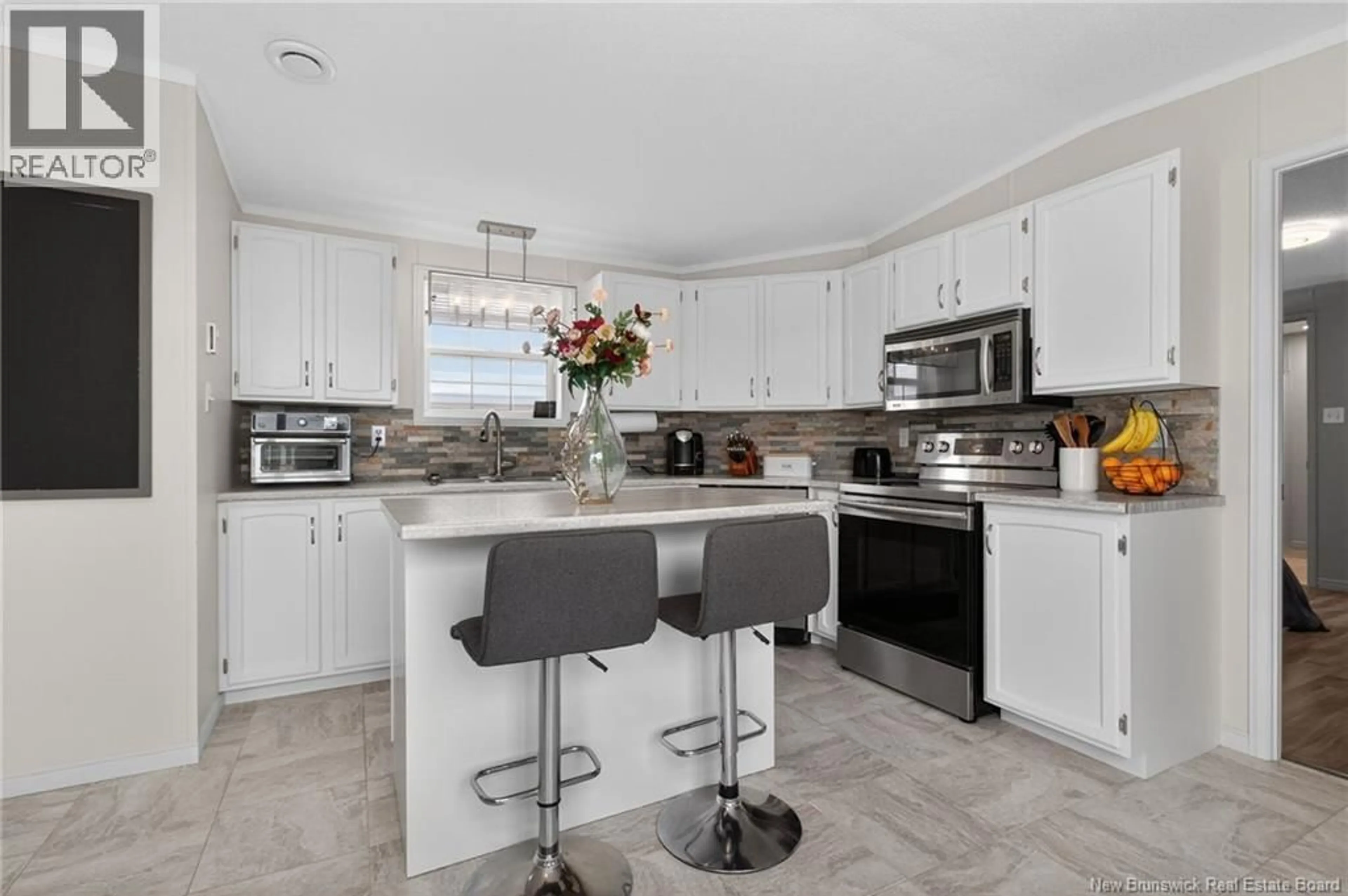 Open concept kitchen, ceramic/tile floor for 111 MIRAMICHI DRIVE, Dieppe New Brunswick E1A7N1