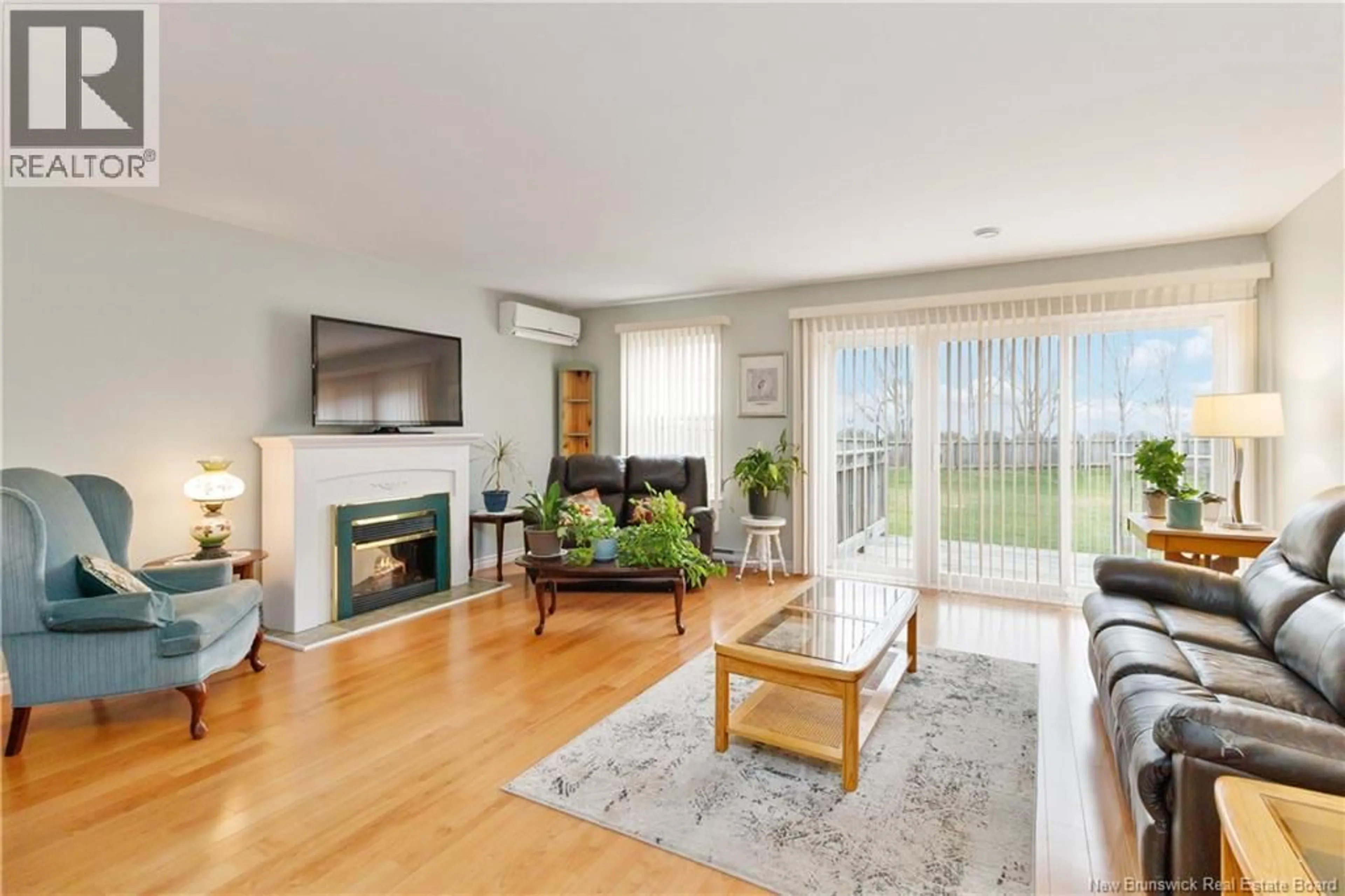 Living room with furniture, wood/laminate floor for 126 - 80 MOUNT PLEASANT ROAD, Moncton New Brunswick E1S5H8