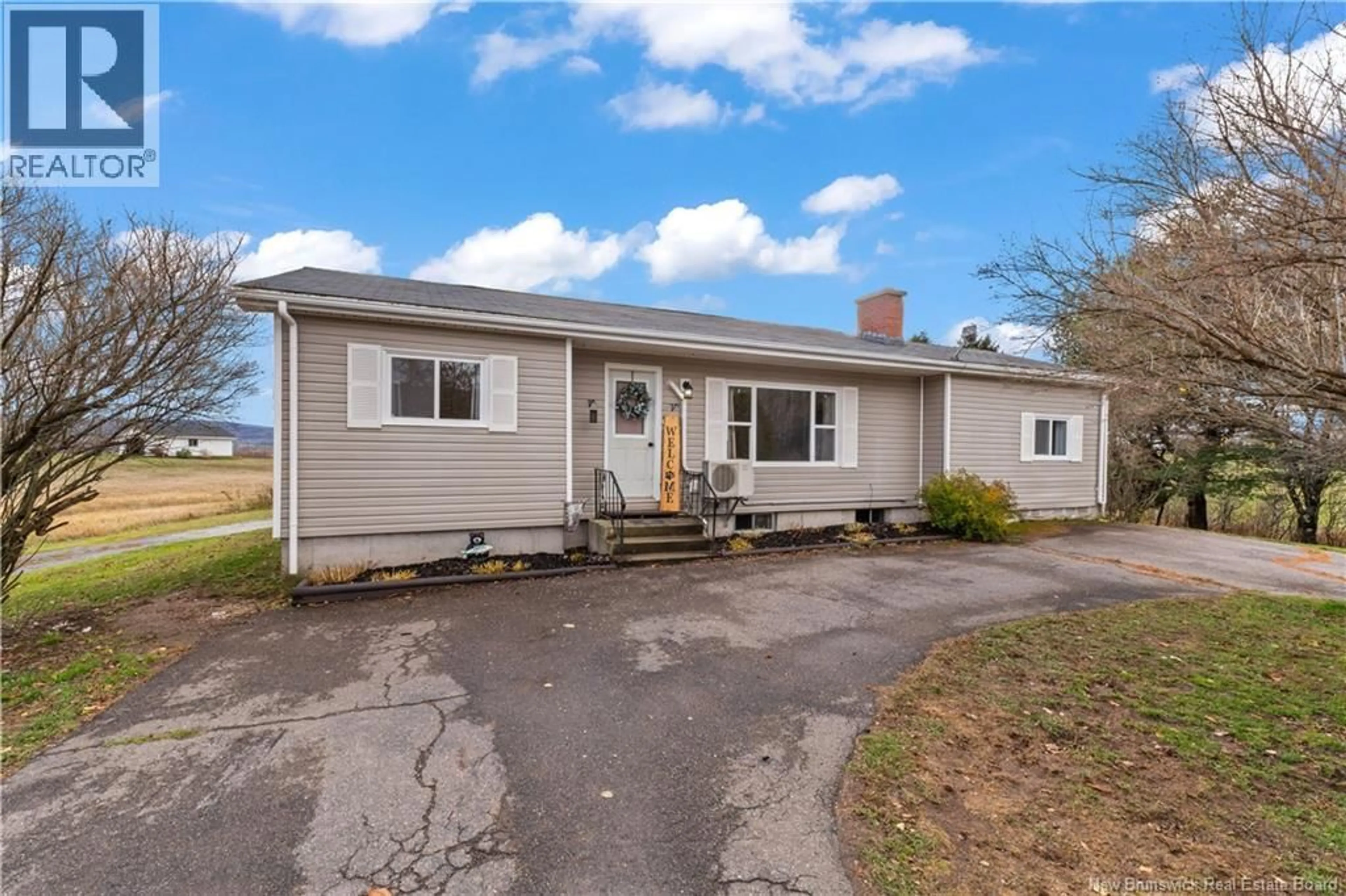 Home with vinyl exterior material, street for 426 ROUTE 121, Bloomfield New Brunswick E5N4T4