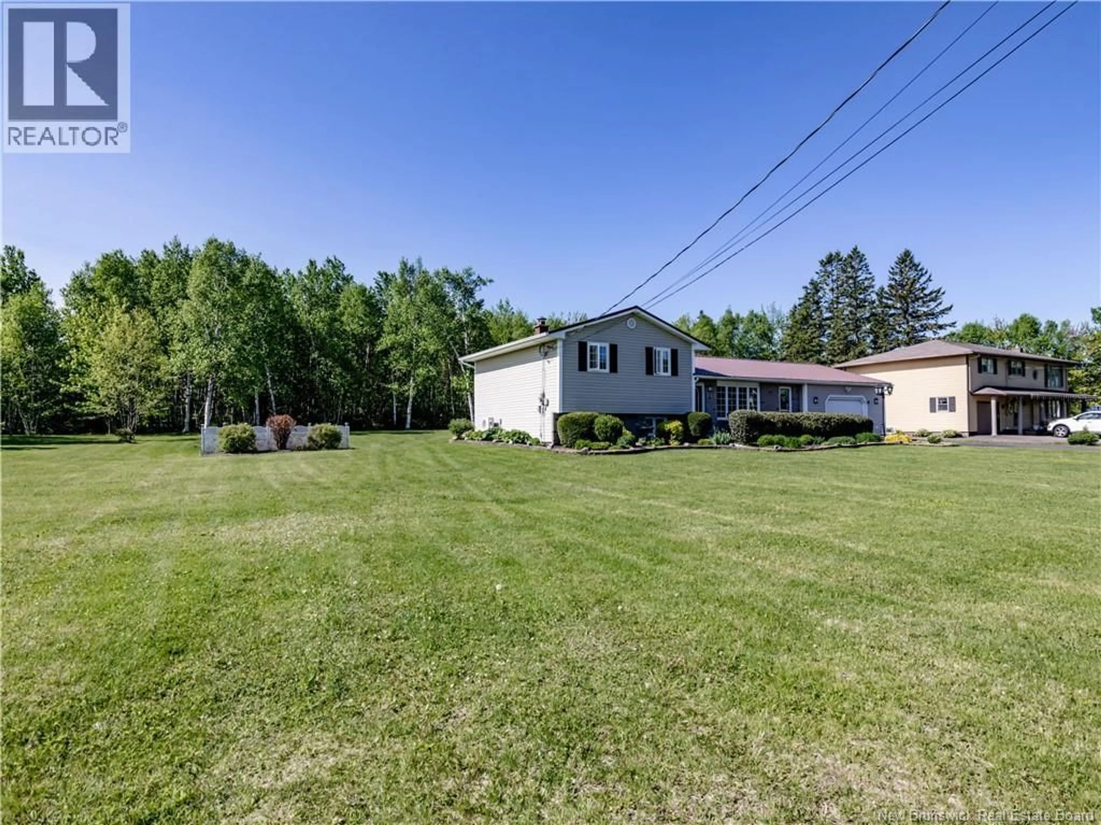 A pic from outside/outdoor area/front of a property/back of a property/a pic from drone, unknown for 117 DE L'EGLISE AVENUE, Saint-Antoine New Brunswick E4V1M2